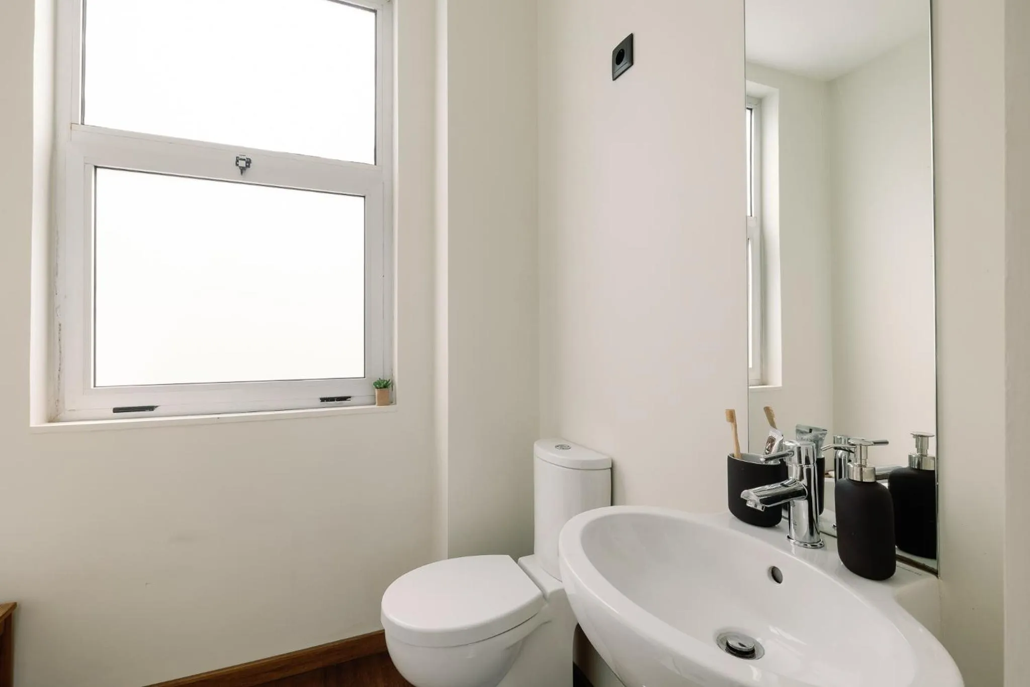 Bathroom in Cosme Apartments by Olala Homes