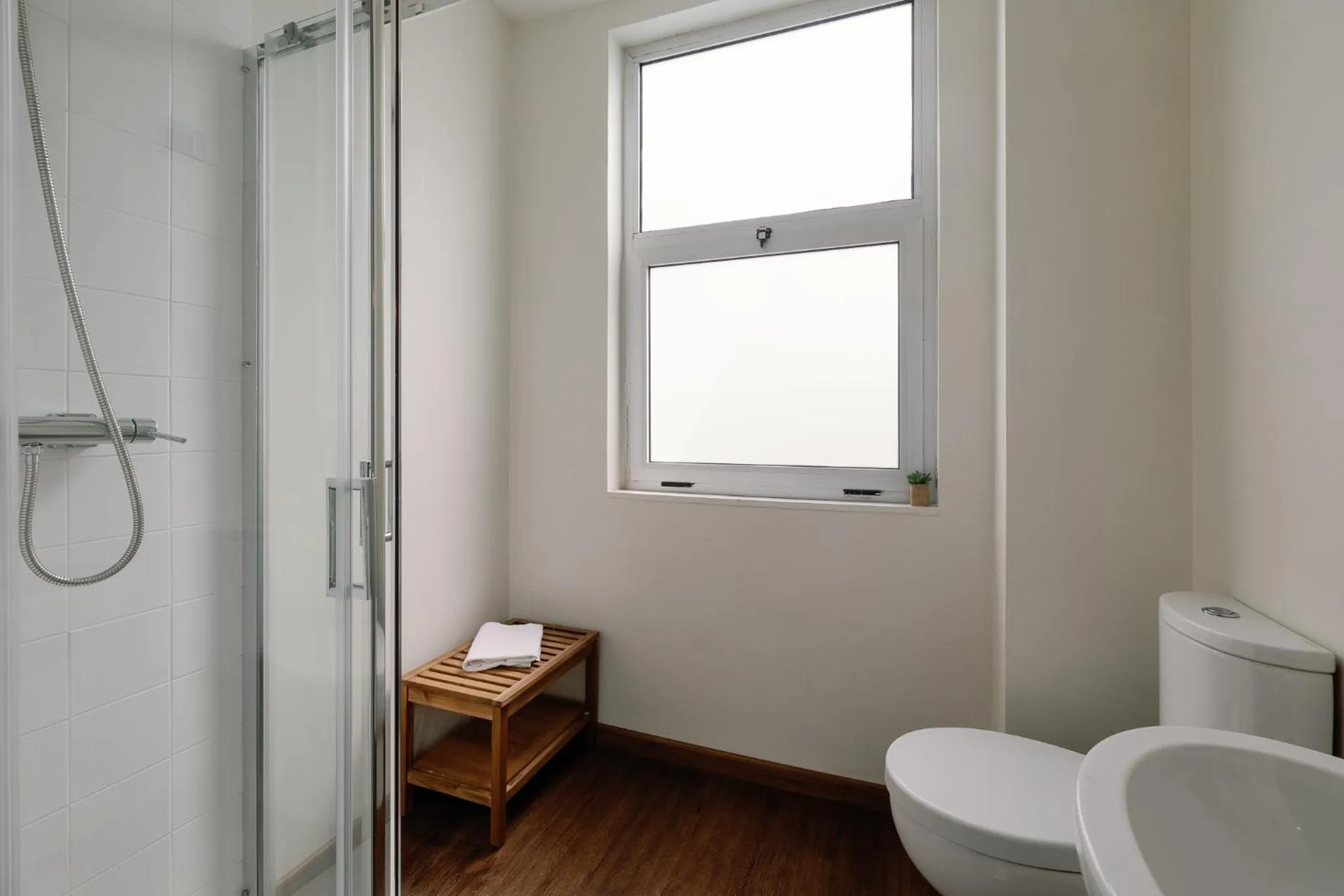 Bathroom in Cosme Apartments by Olala Homes