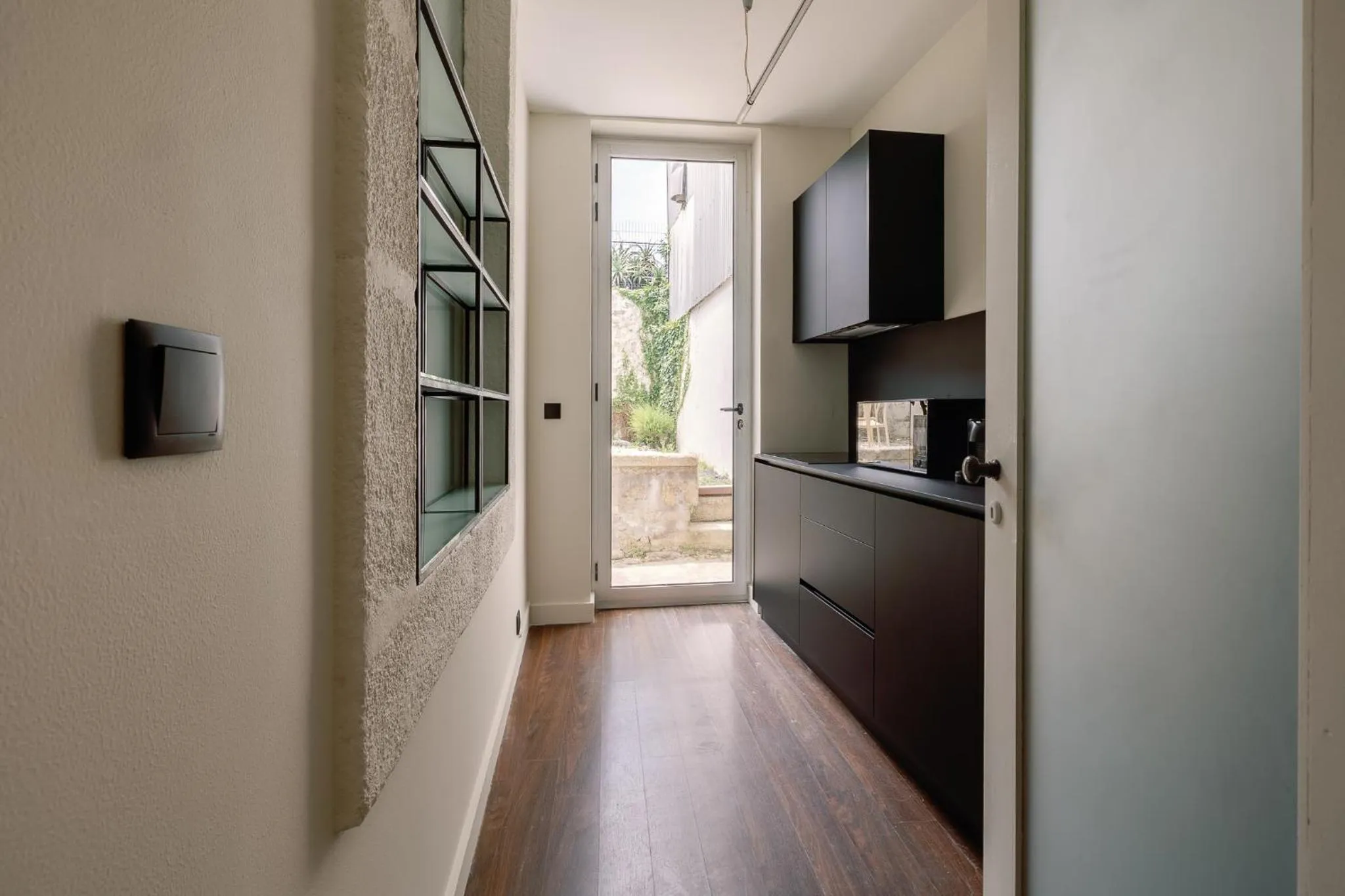kitchen in Cosme Apartments by Olala Homes