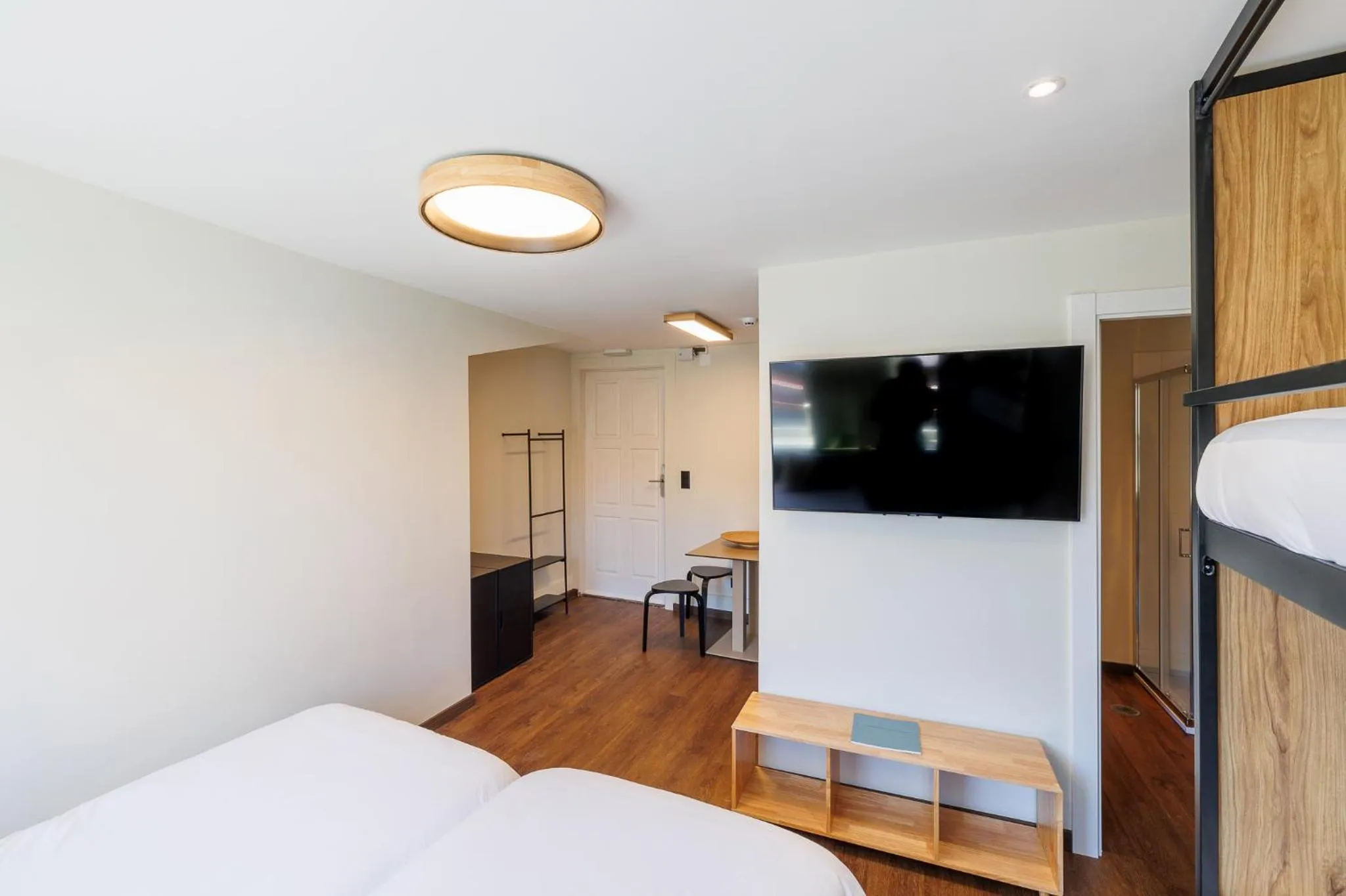 Bedroom, Bed in Cosme Apartments by Olala Homes