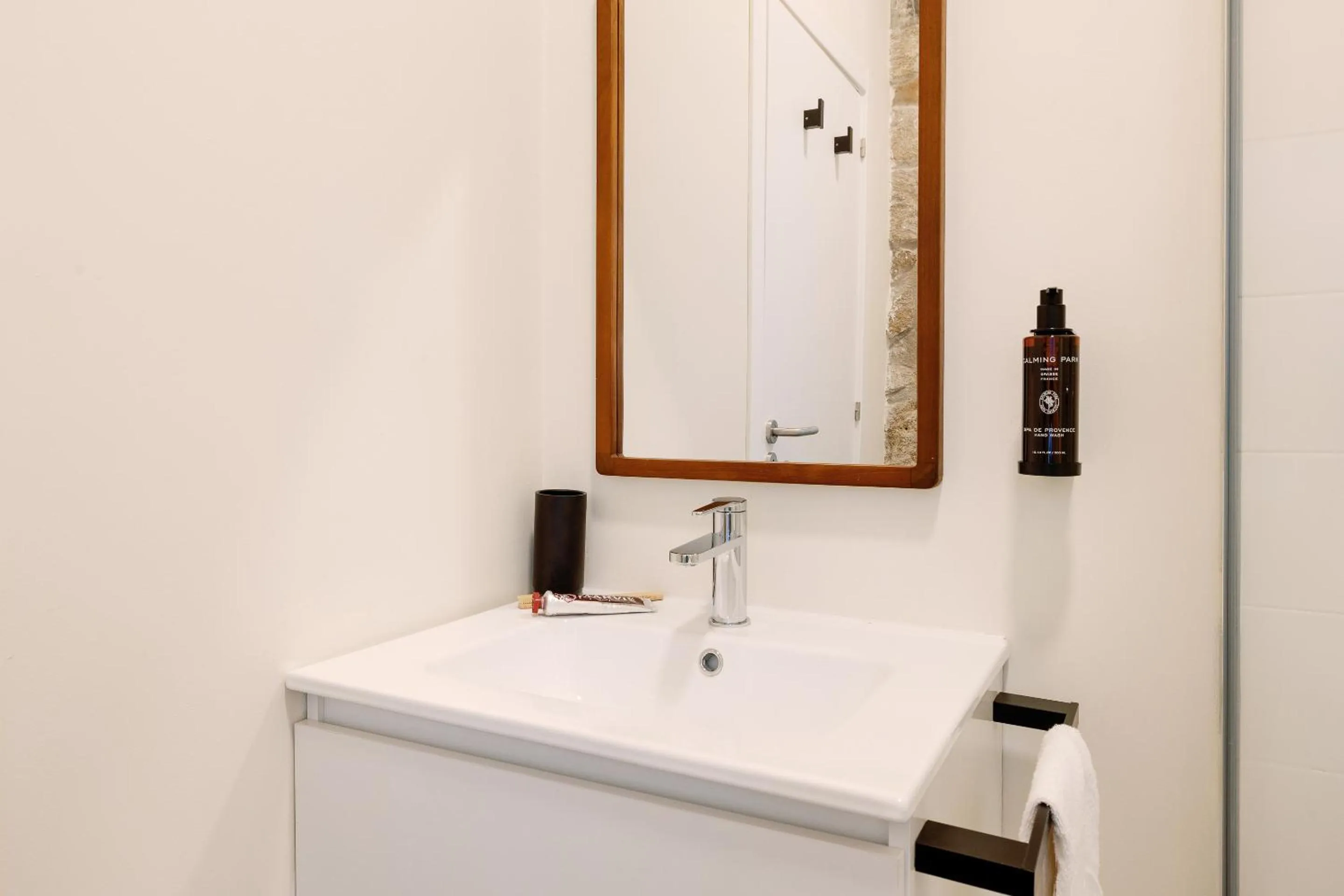 Bathroom in Cosme Apartments by Olala Homes