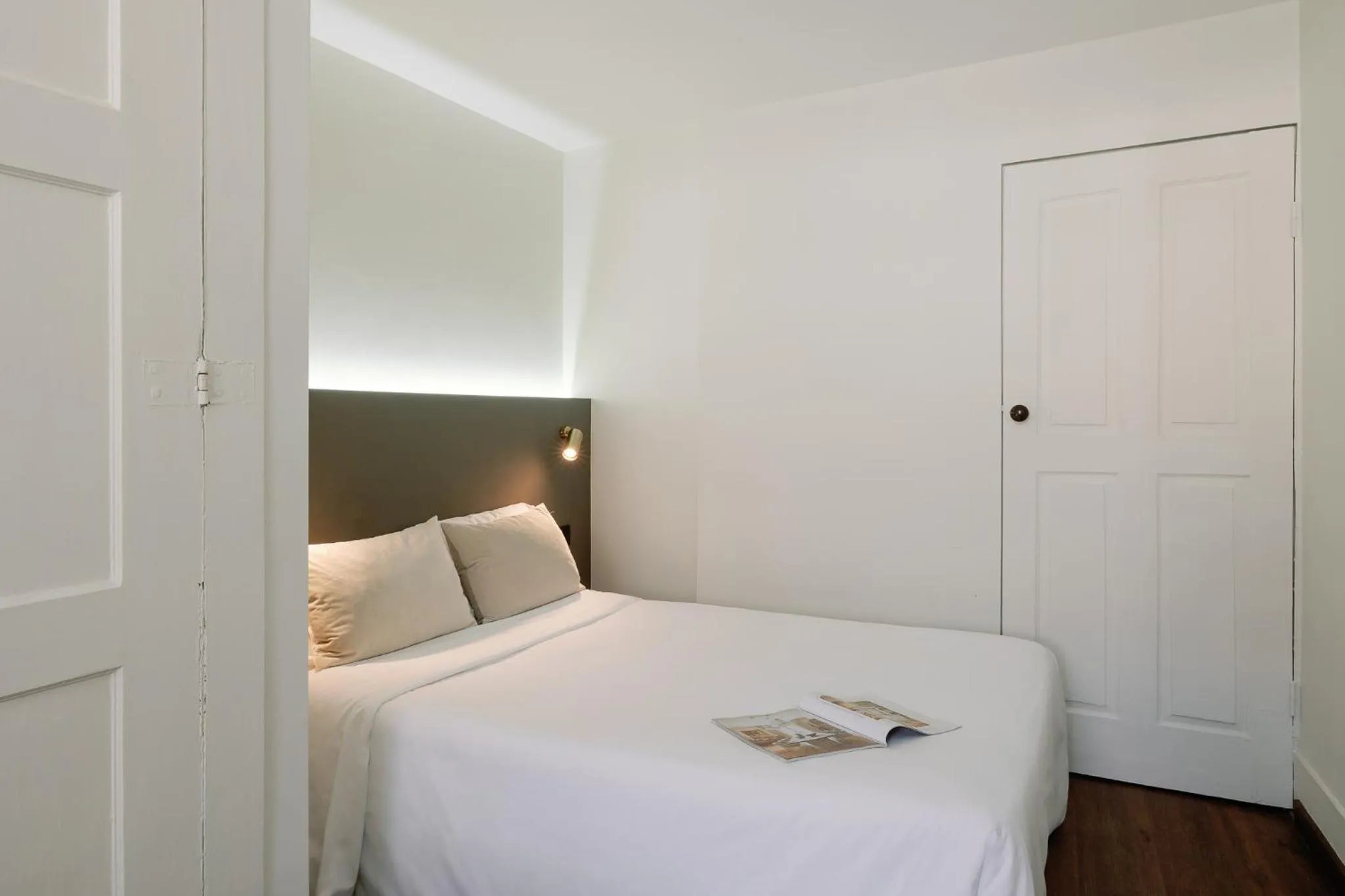 Bedroom, Bed in Cosme Apartments by Olala Homes