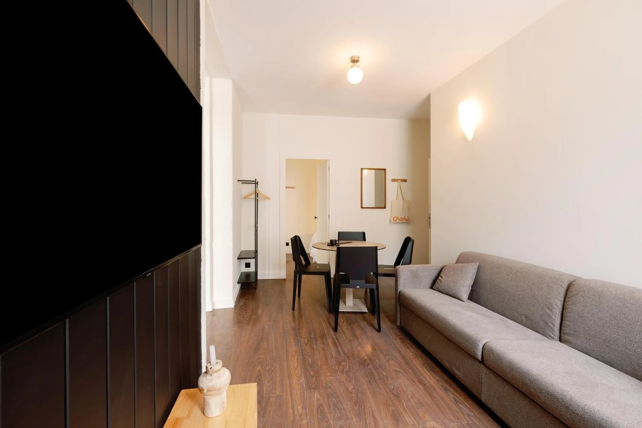 Living room in Cosme Apartments by Olala Homes