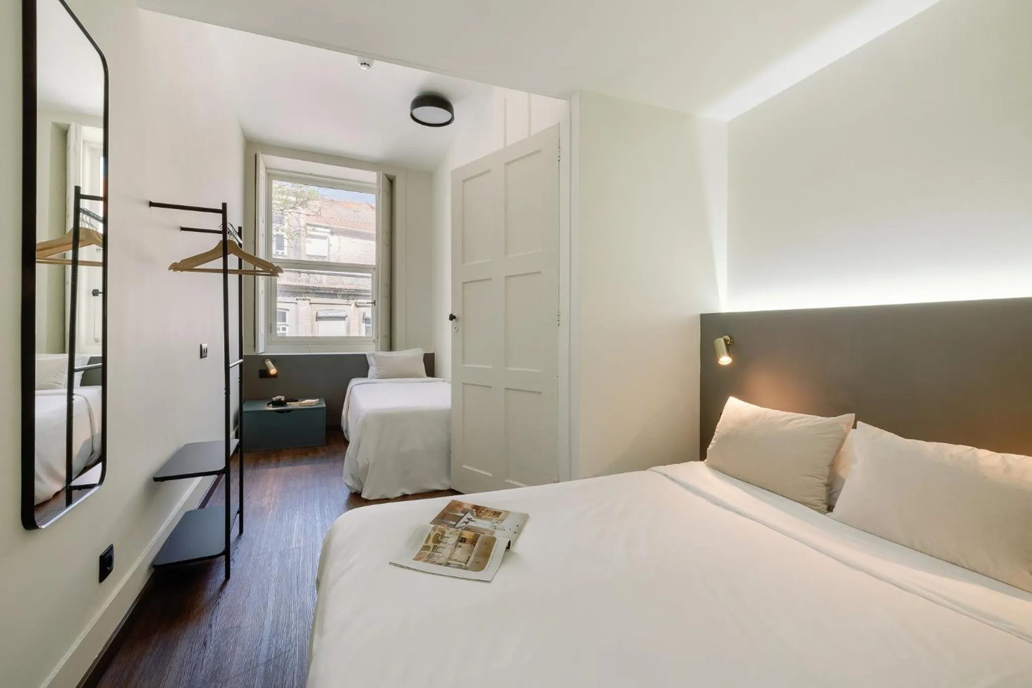 Bedroom, Bed in Cosme Apartments by Olala Homes