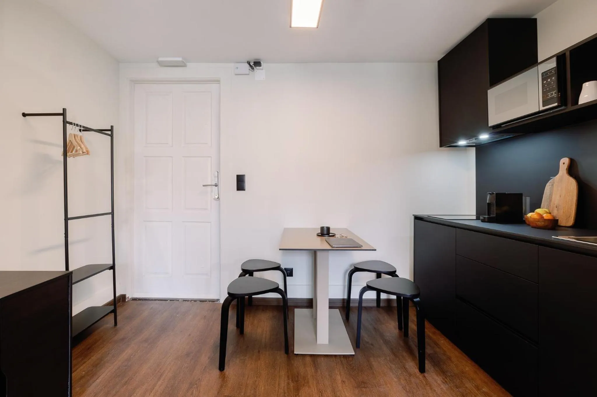 kitchen in Cosme Apartments by Olala Homes