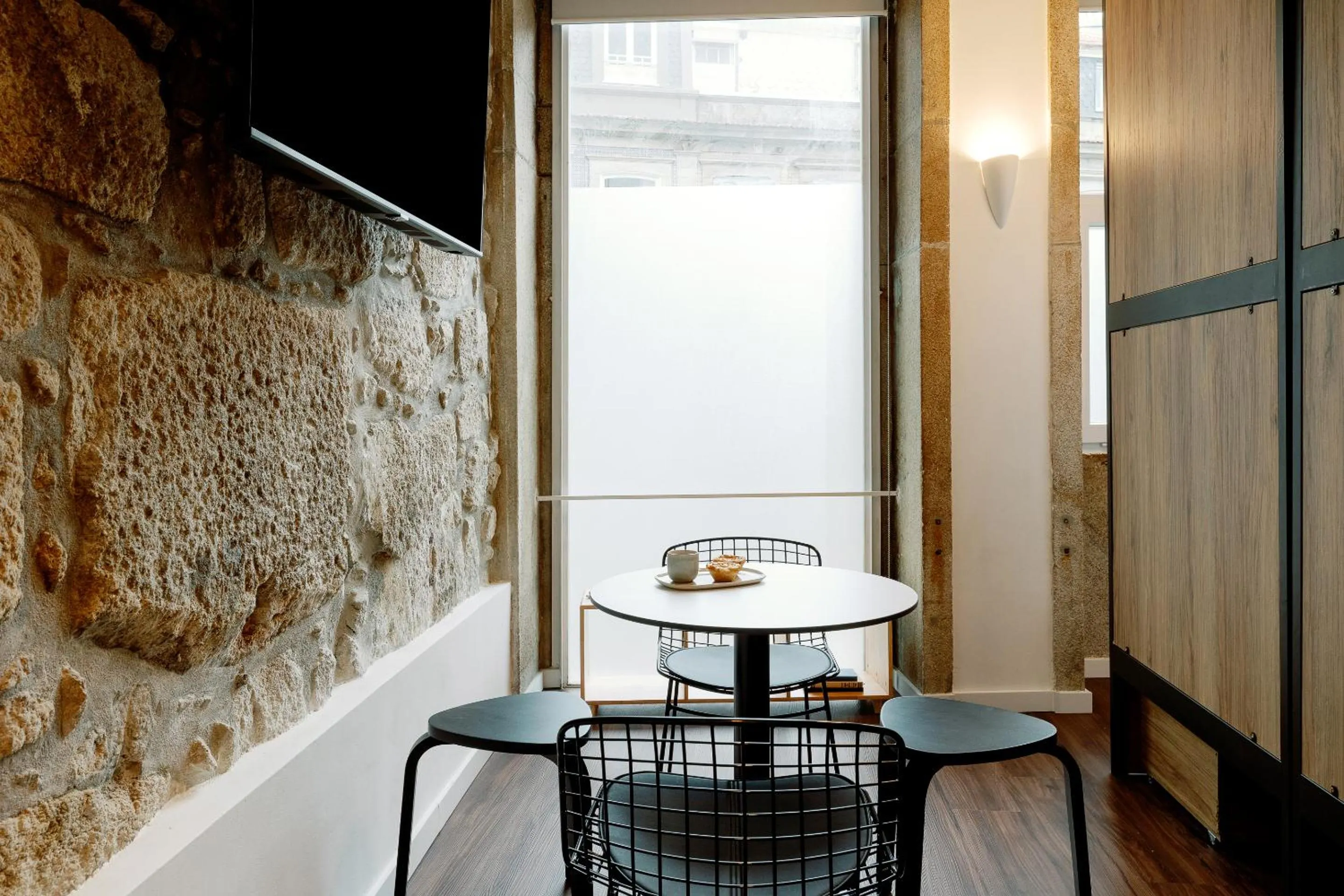 Living room in Cosme Apartments by Olala Homes