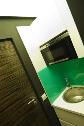 Kitchen or kitchenette in Ivana Hotel