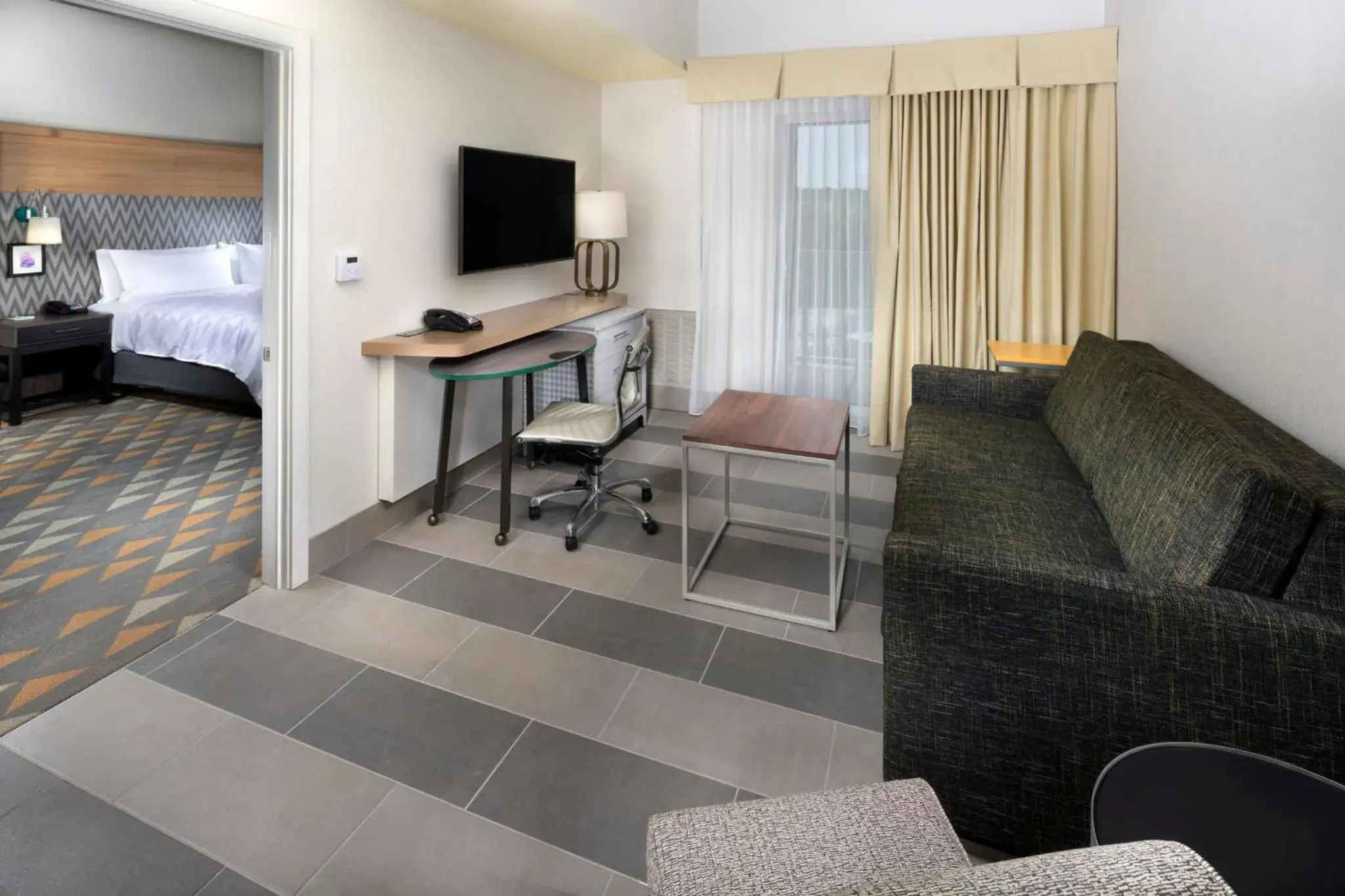 Bedroom in Holiday Inn & Suites Arden - Asheville Airport by IHG Bedroom in Holiday Inn & Suites Arden - Asheville Airport by IHG