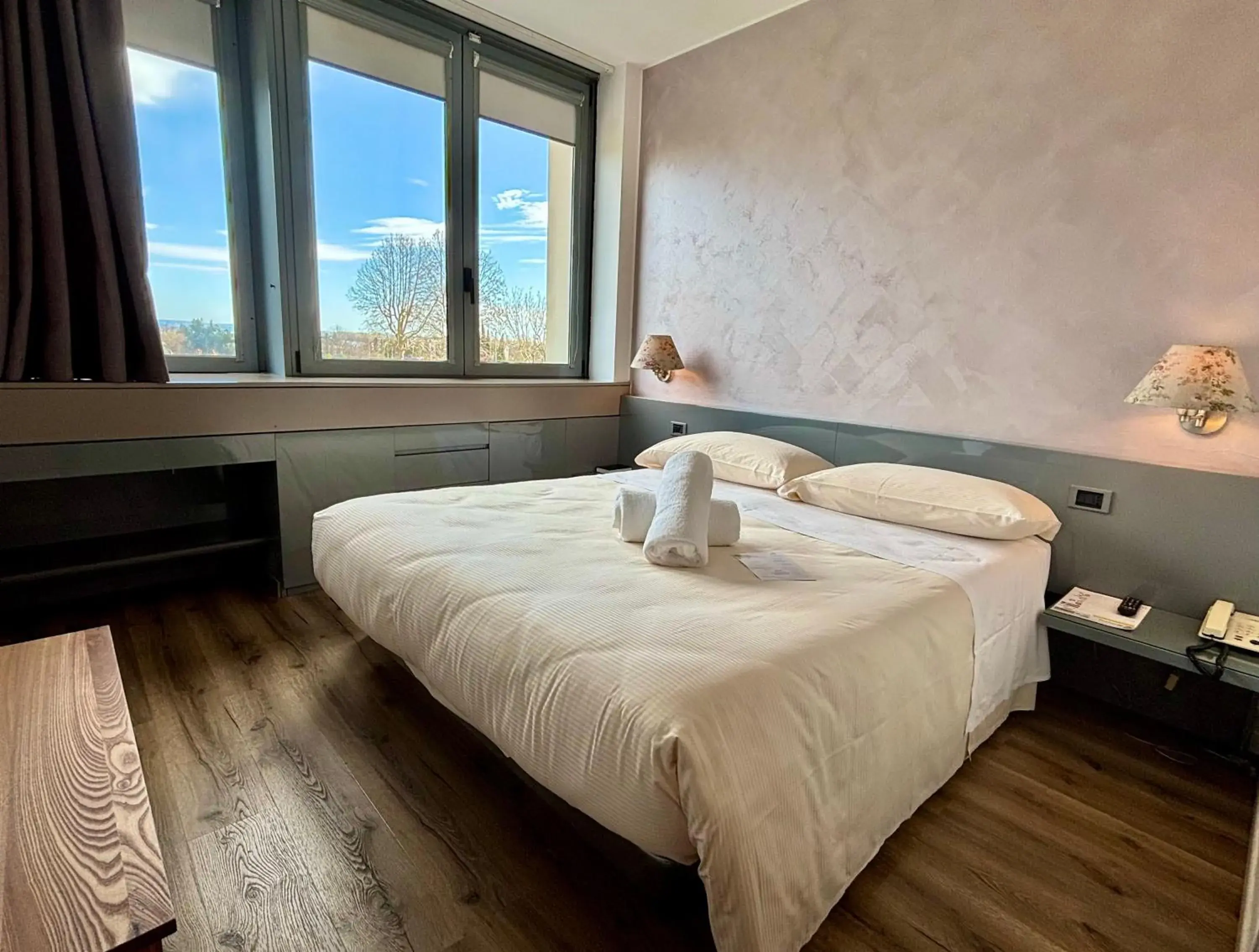 Bed in Hotel Alfieri Bed in Hotel Alfieri