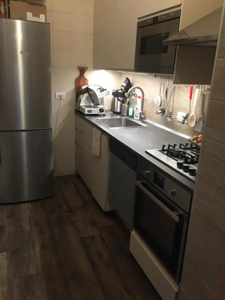 Kitchen or kitchenette in Relais Totì BeB bed e breakfast