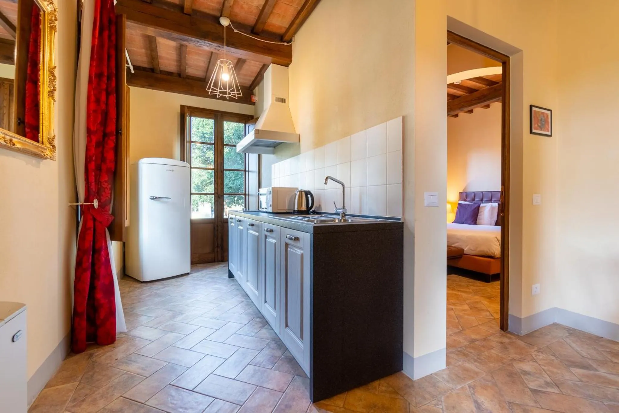kitchen, Bed in Boccioleto Resort - Place of Charme