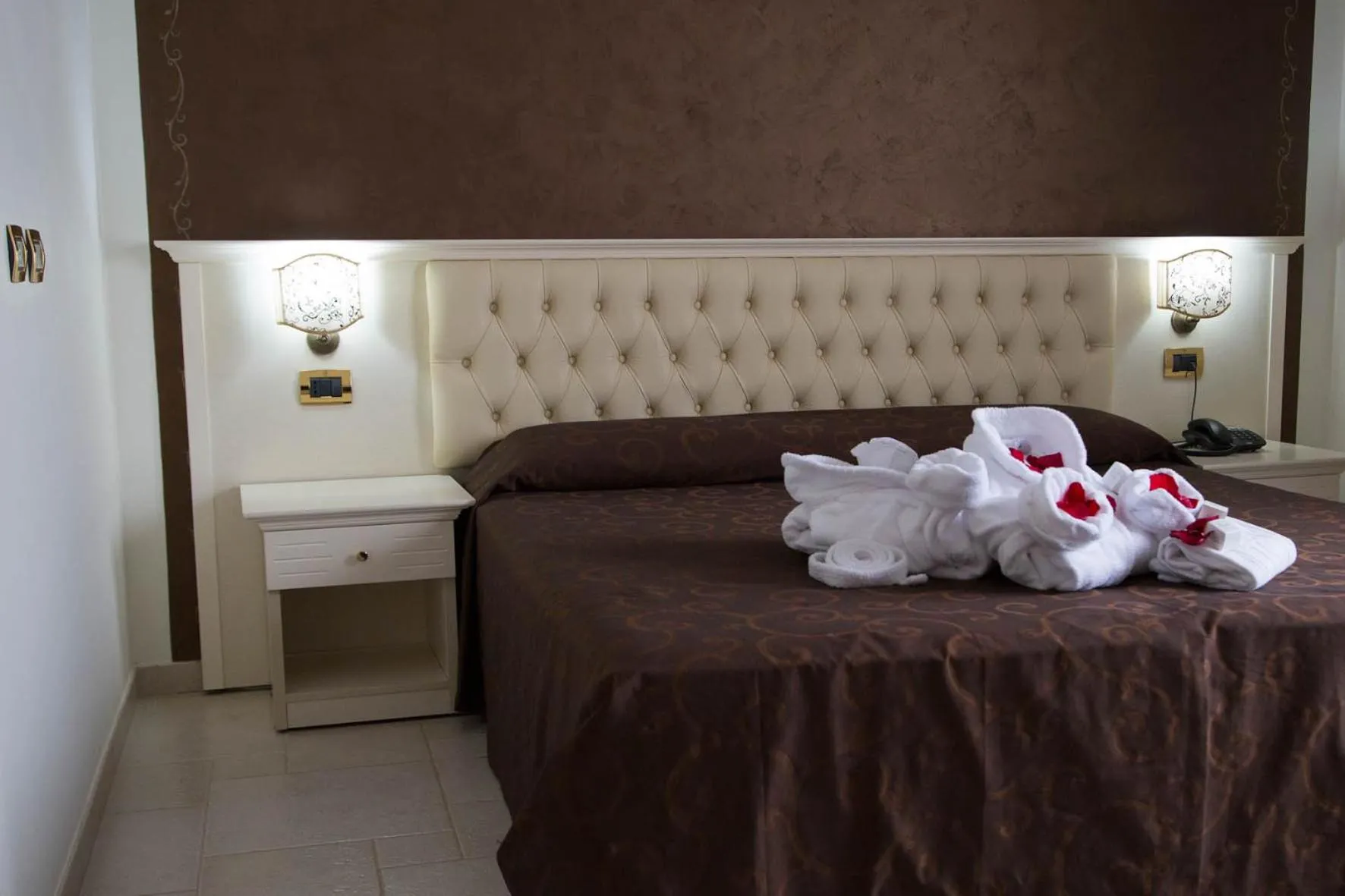 Decorative detail, Bed in Hotel Madonna Delle Grazie