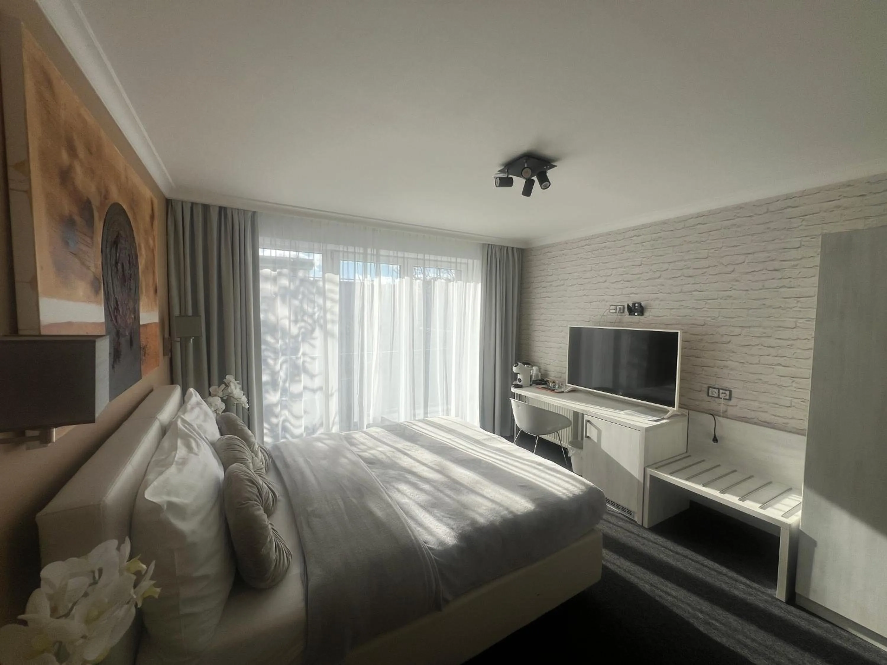 Bed in Grand Petit Hotel ex Shato Gesson