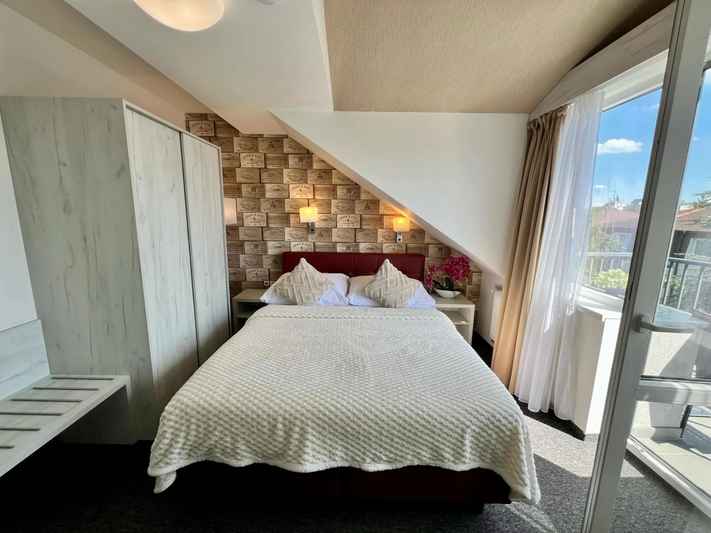 Bed in Grand Petit Hotel ex Shato Gesson