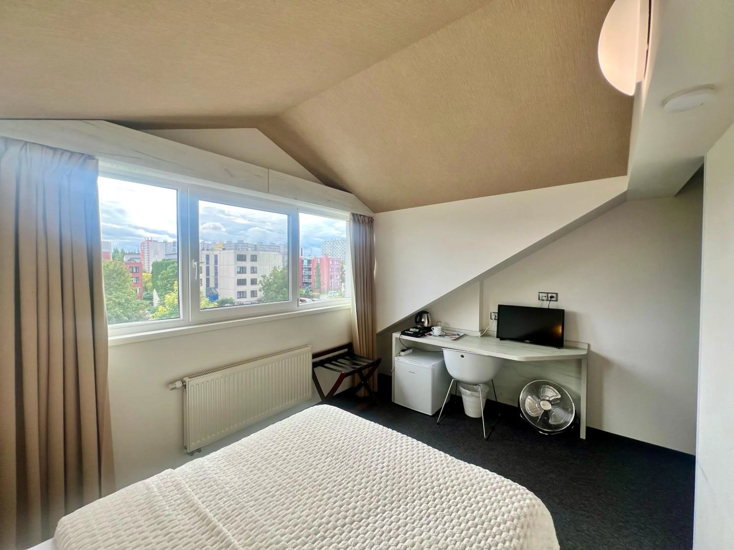 Bed in Grand Petit Hotel ex Shato Gesson