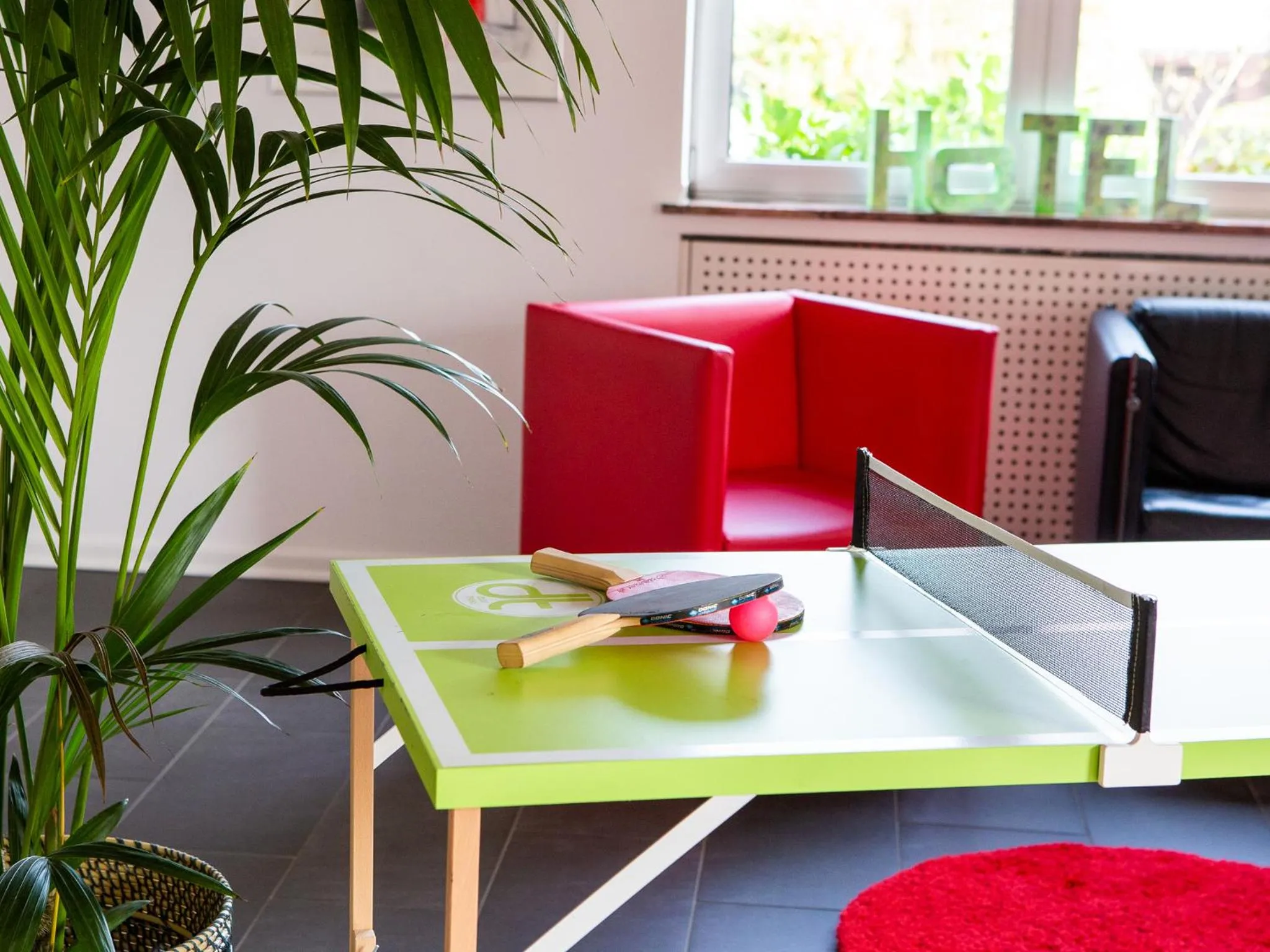 Communal lounge/ TV room in Hotel Eikamper Höhe