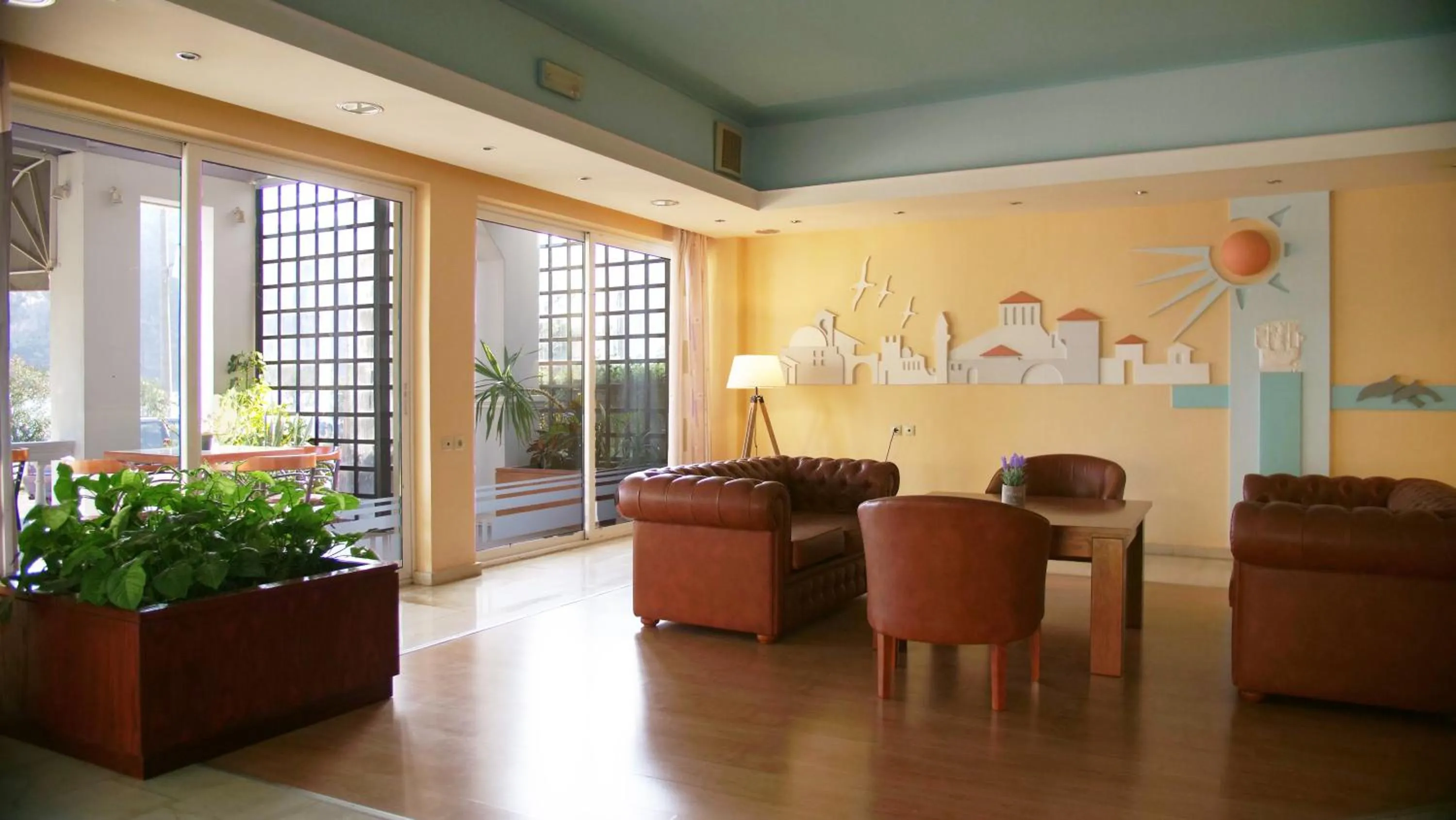 Communal lounge/ TV room in Antikyra Beach Hotel