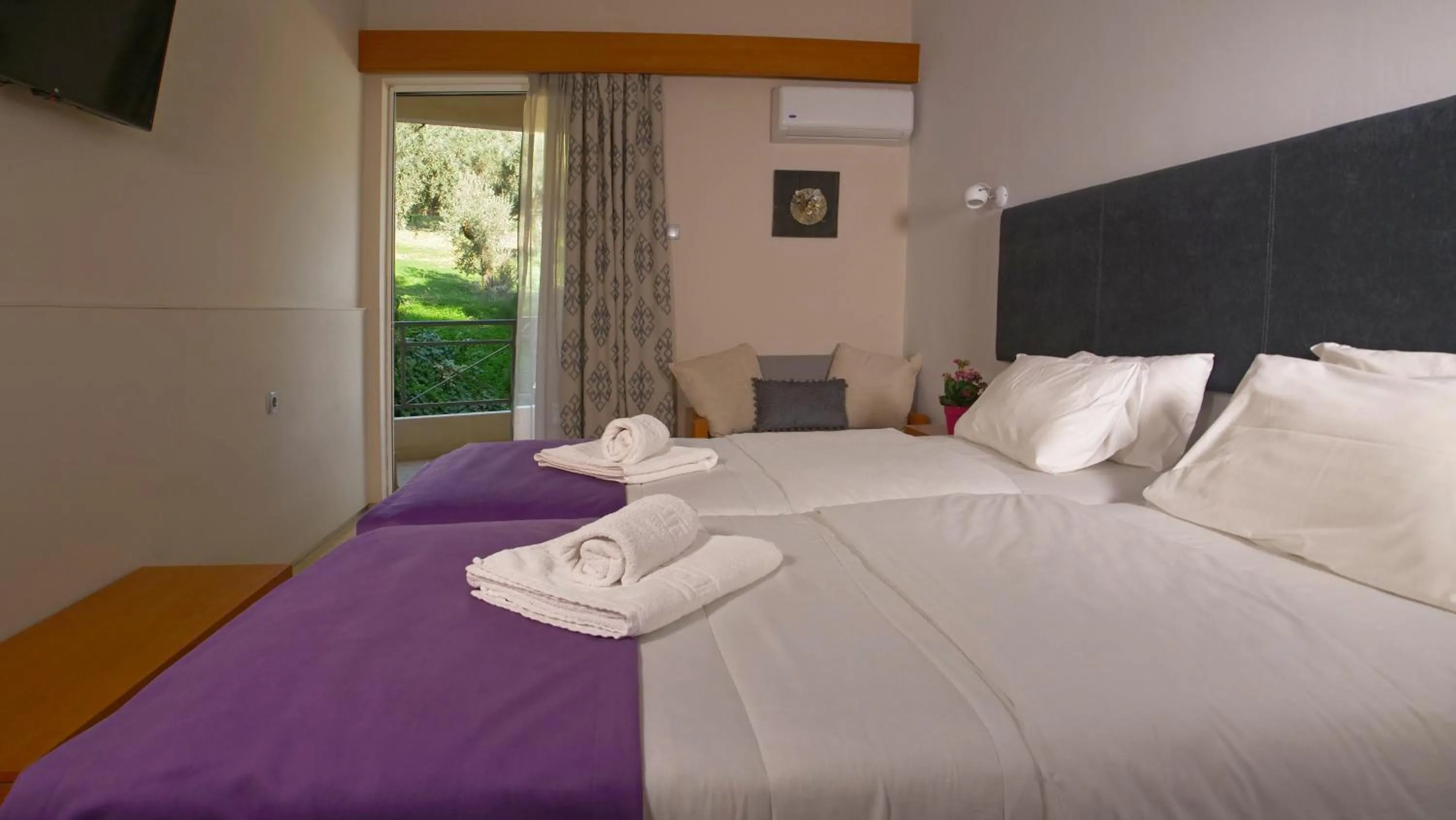 Bed in Antikyra Beach Hotel