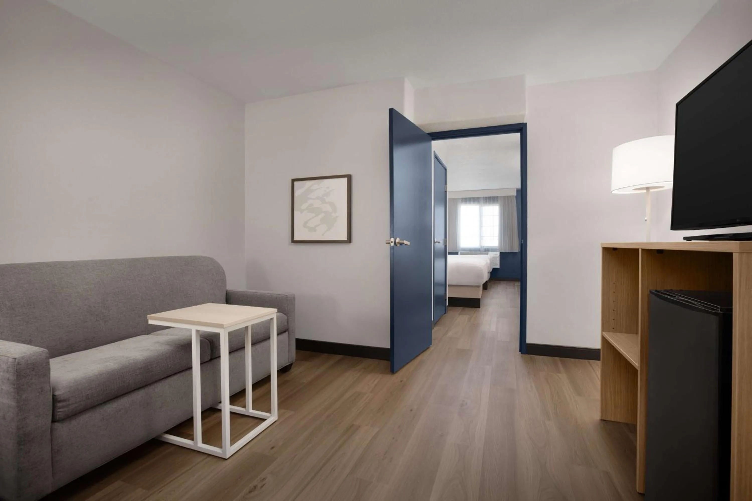 Living room, Bed in Best Western Plus Executive Suites Albuquerque