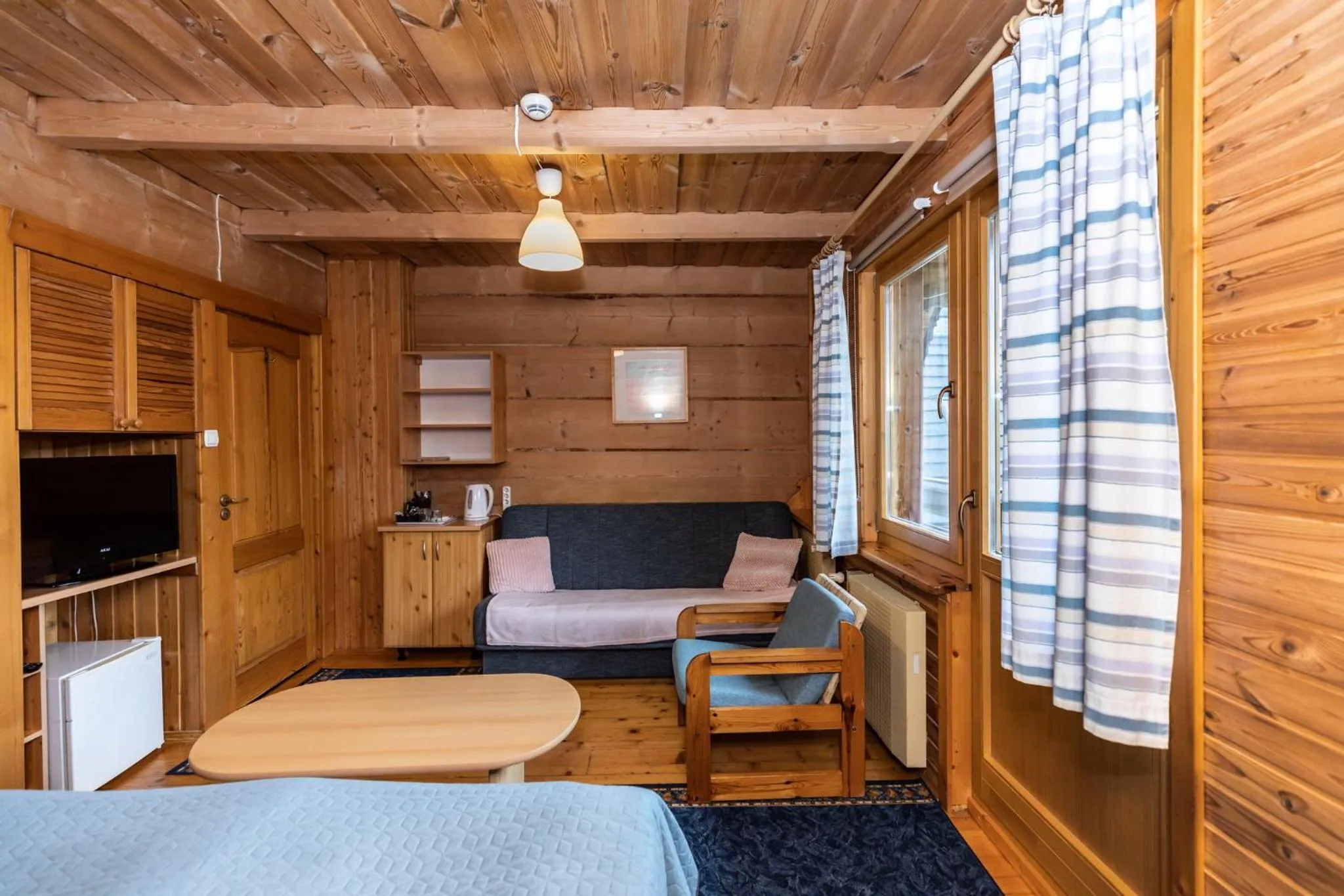 Seating area, Bed in Willa Koisowka