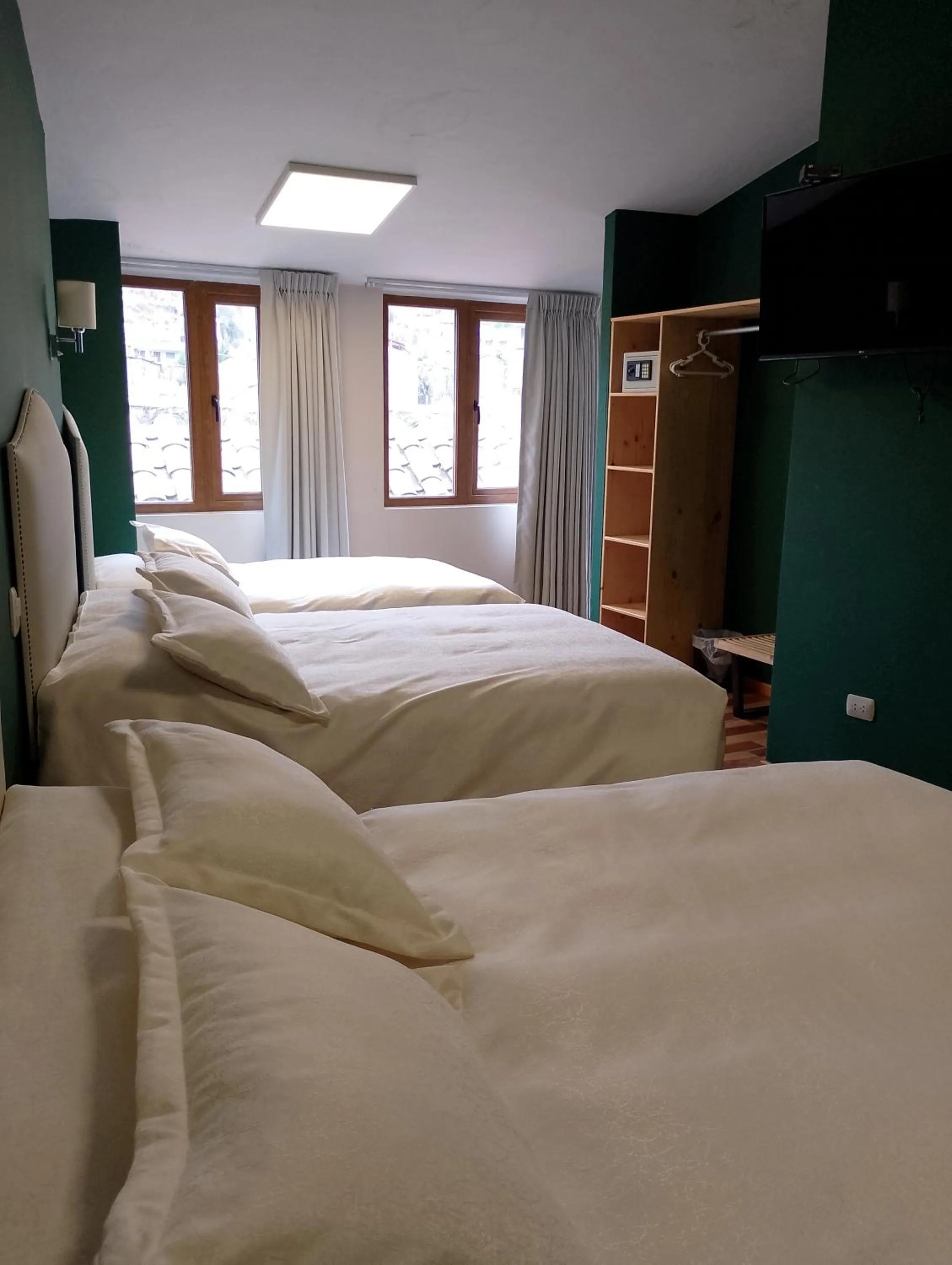 Bed in Anden Inca Hotel