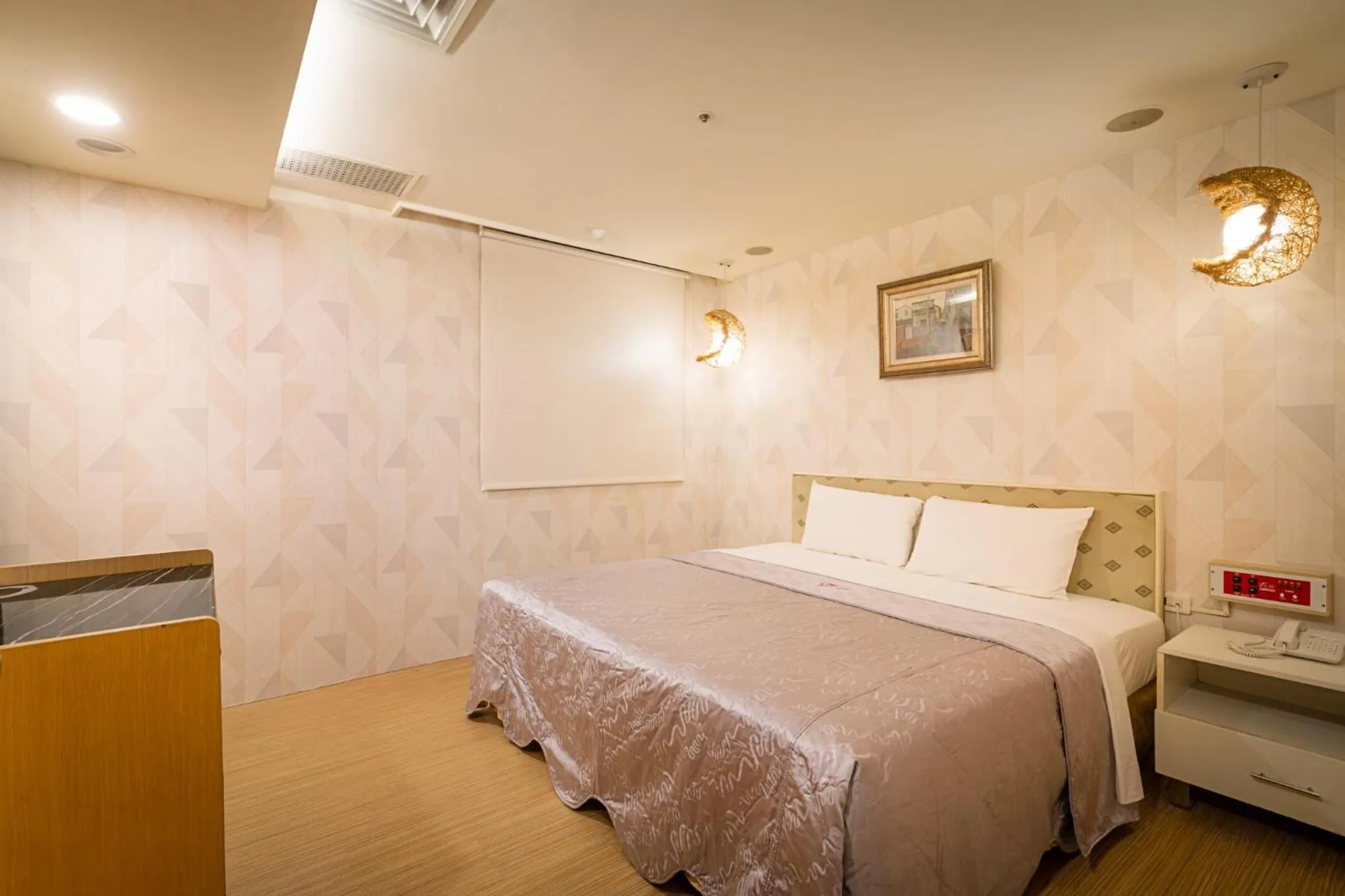 Bed in Tai Lee Hotel