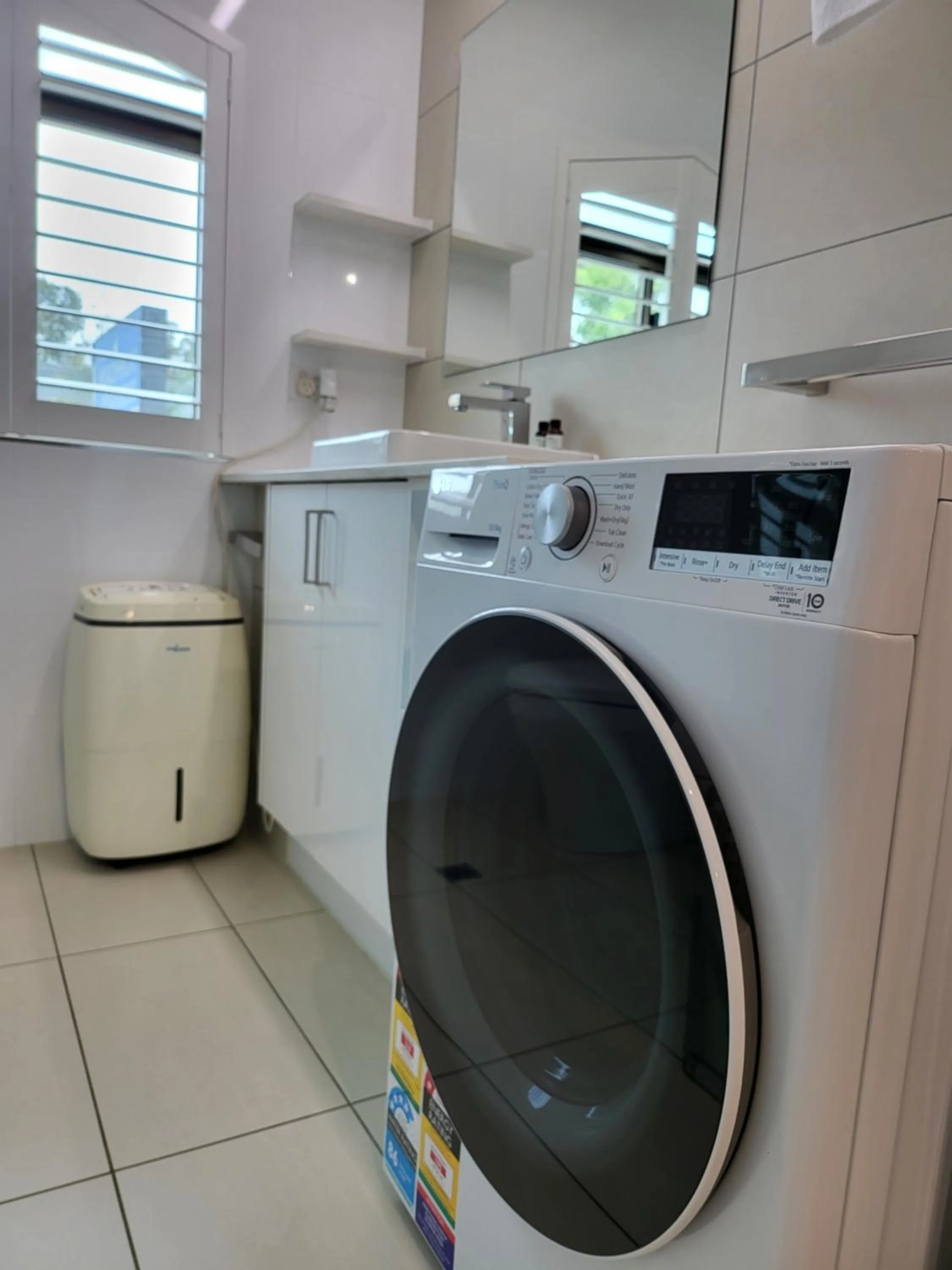 washing machine in Byron Bay Beachfront Apartments