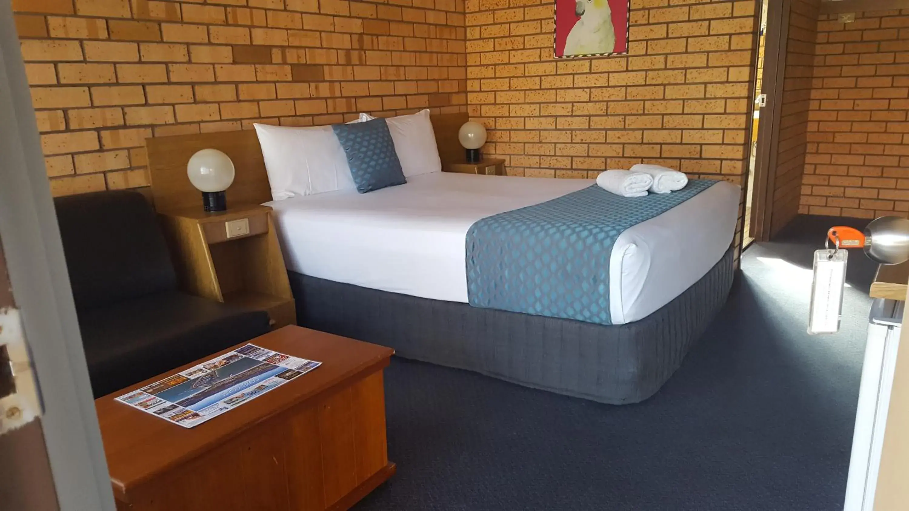 Bed in Royal Palms Motor Inn Bed in Royal Palms Motor Inn