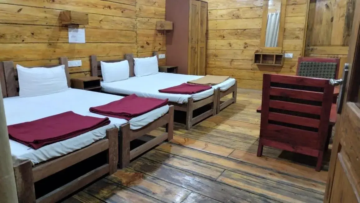 Bed in Brushwood Villa- Cottages and Bar Bed in Brushwood Villa- Cottages and Bar