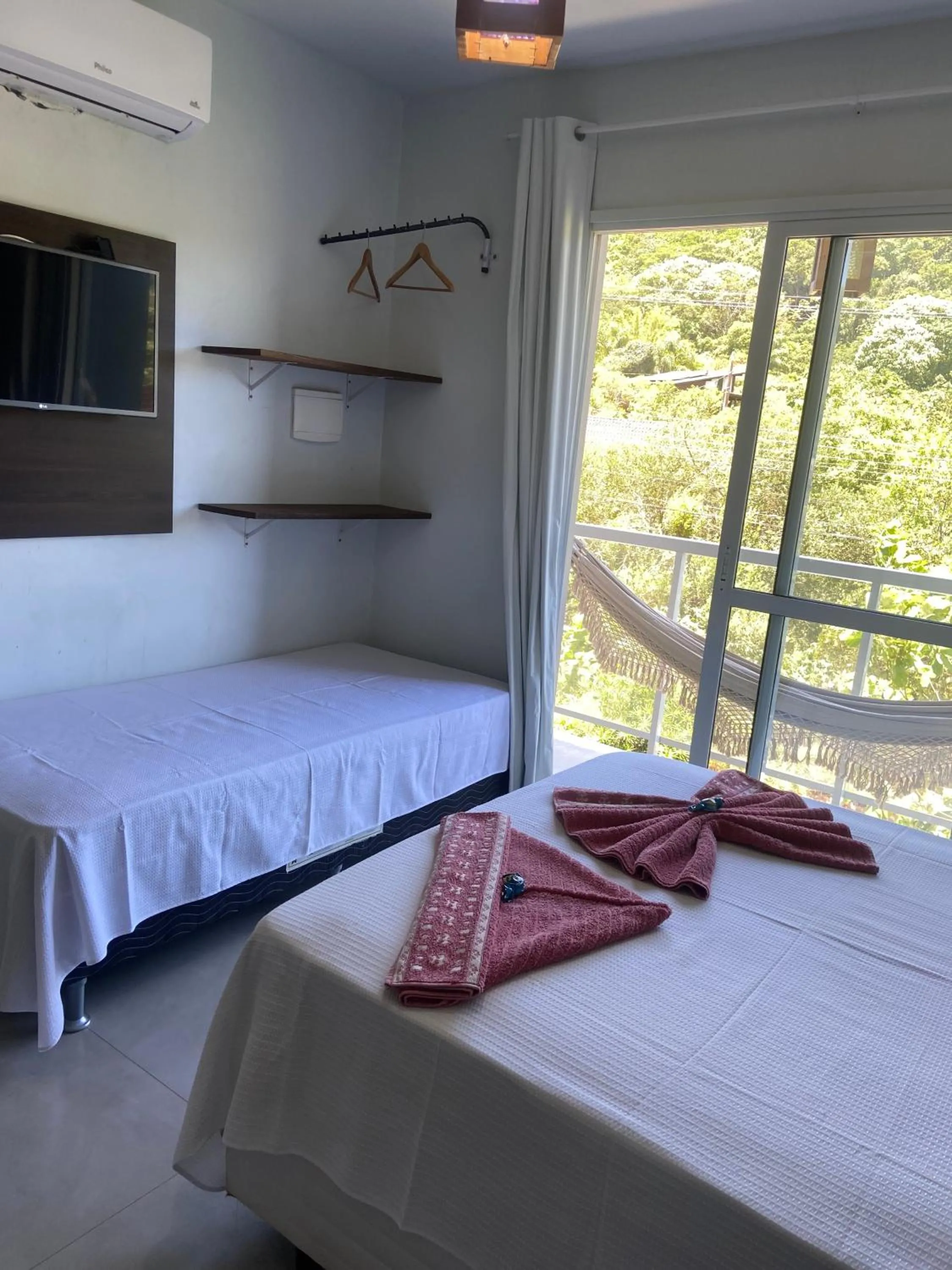 Bed in Pousada Azul Oceano