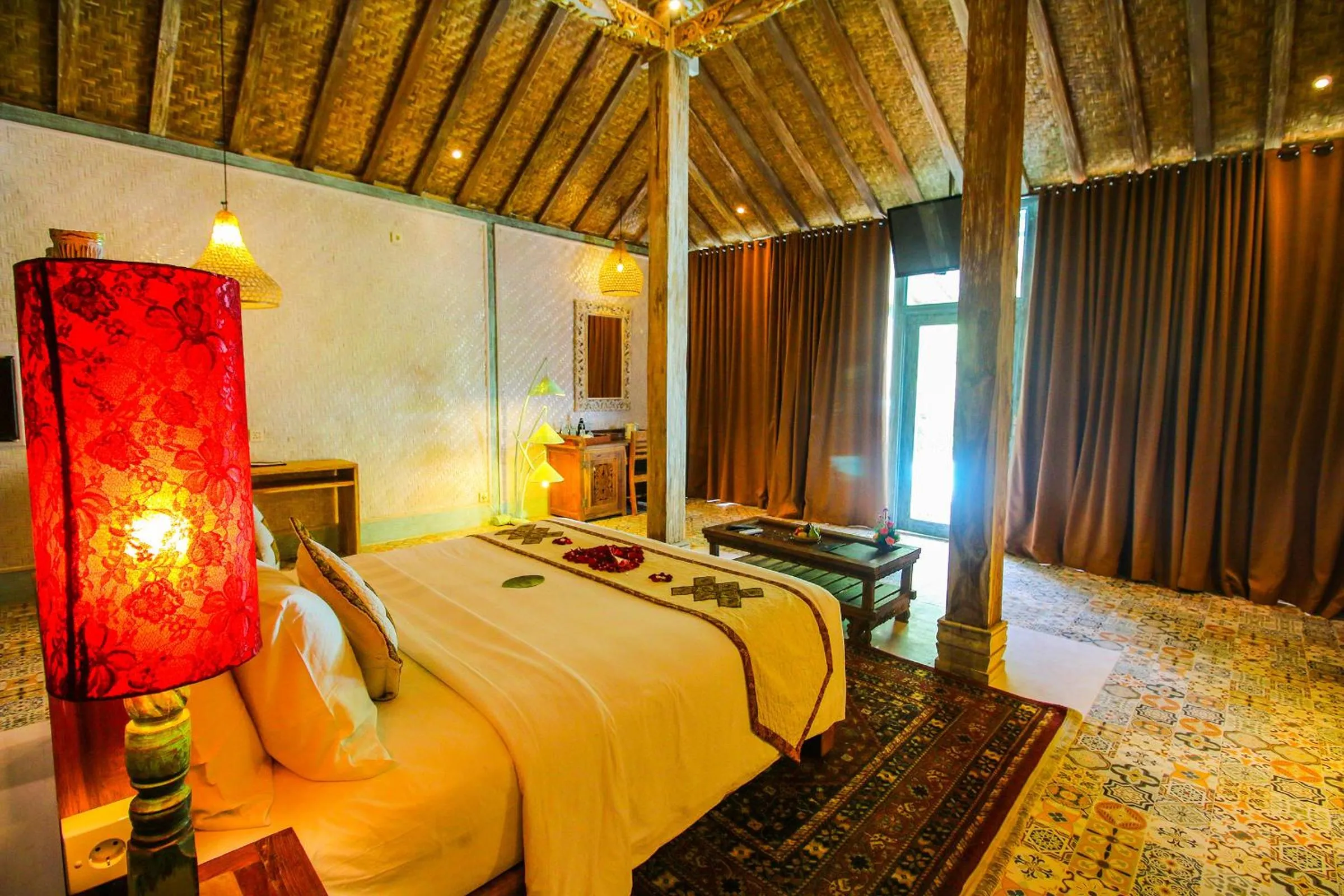 Bed in Kupu Kupu Jimbaran Beach Hotel & Spa by L’Occitane