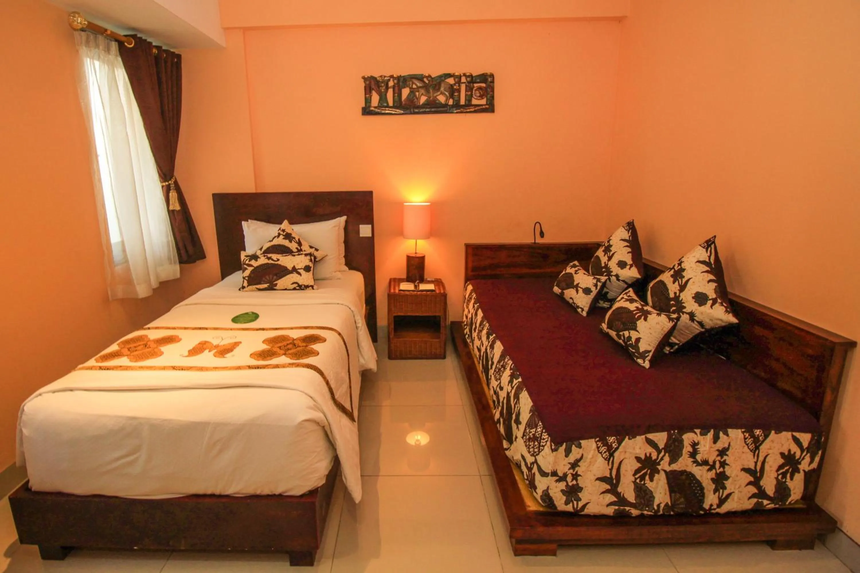 Bed in Kupu Kupu Jimbaran Beach Hotel & Spa by L’Occitane
