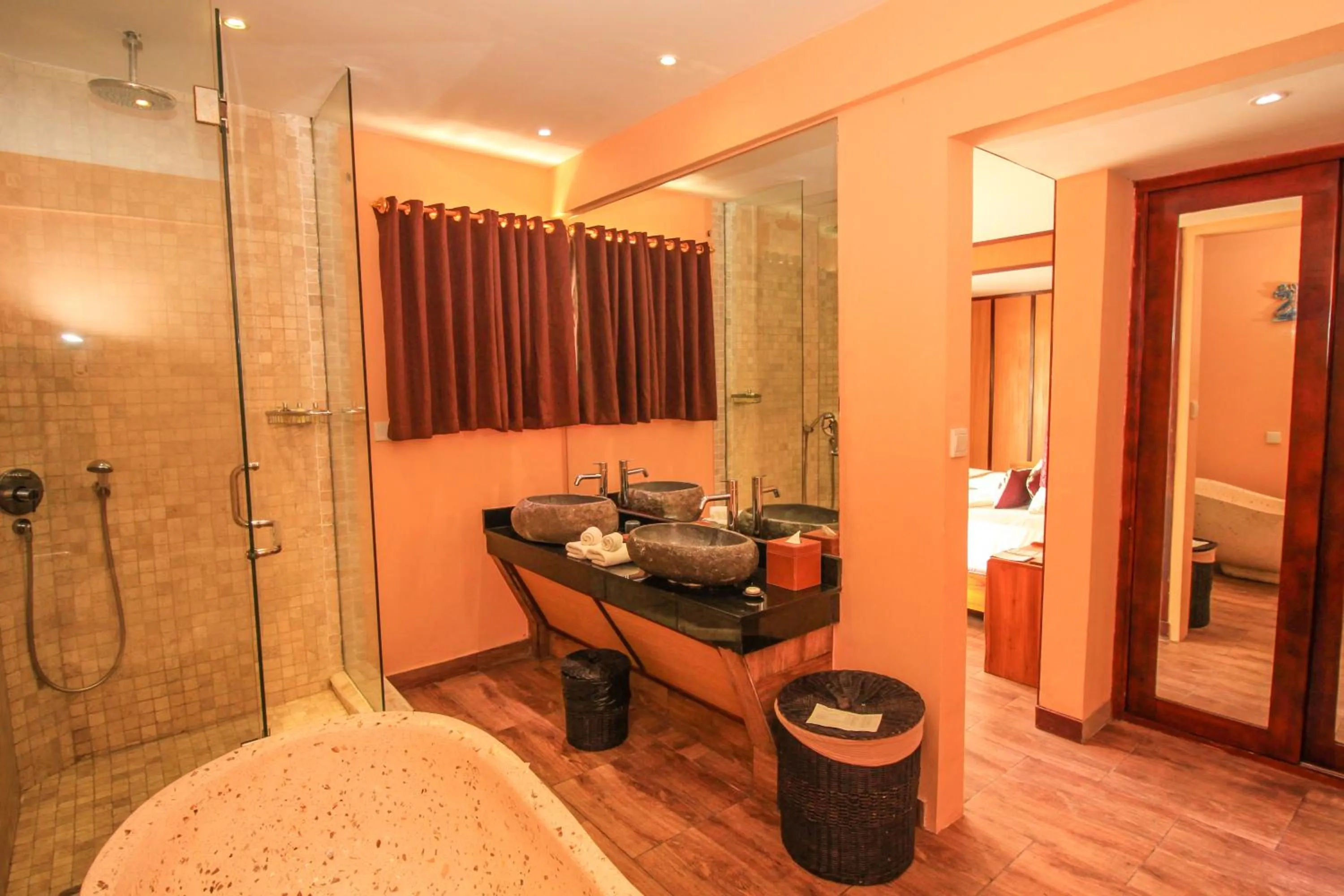 Bathroom in Kupu Kupu Jimbaran Beach Hotel & Spa by L’Occitane