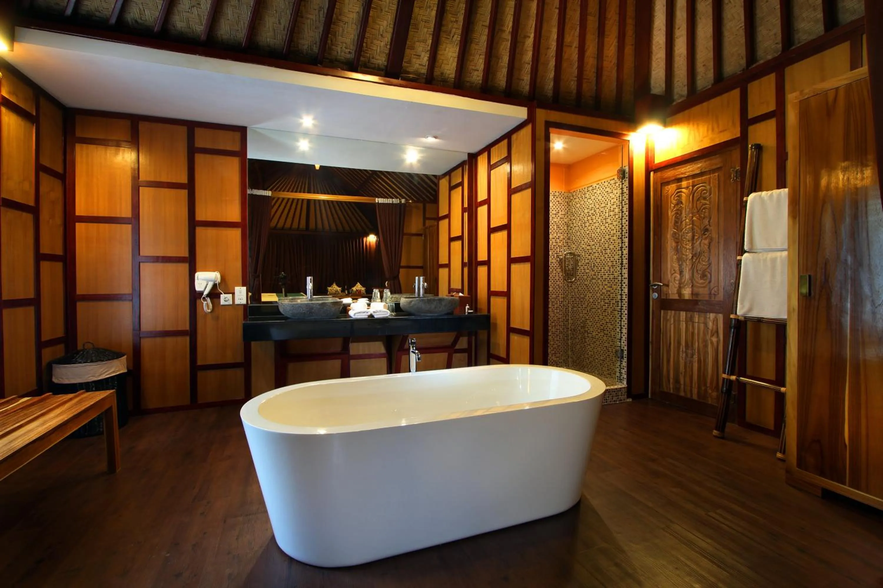 Bathroom in Kupu Kupu Jimbaran Beach Hotel & Spa by L’Occitane