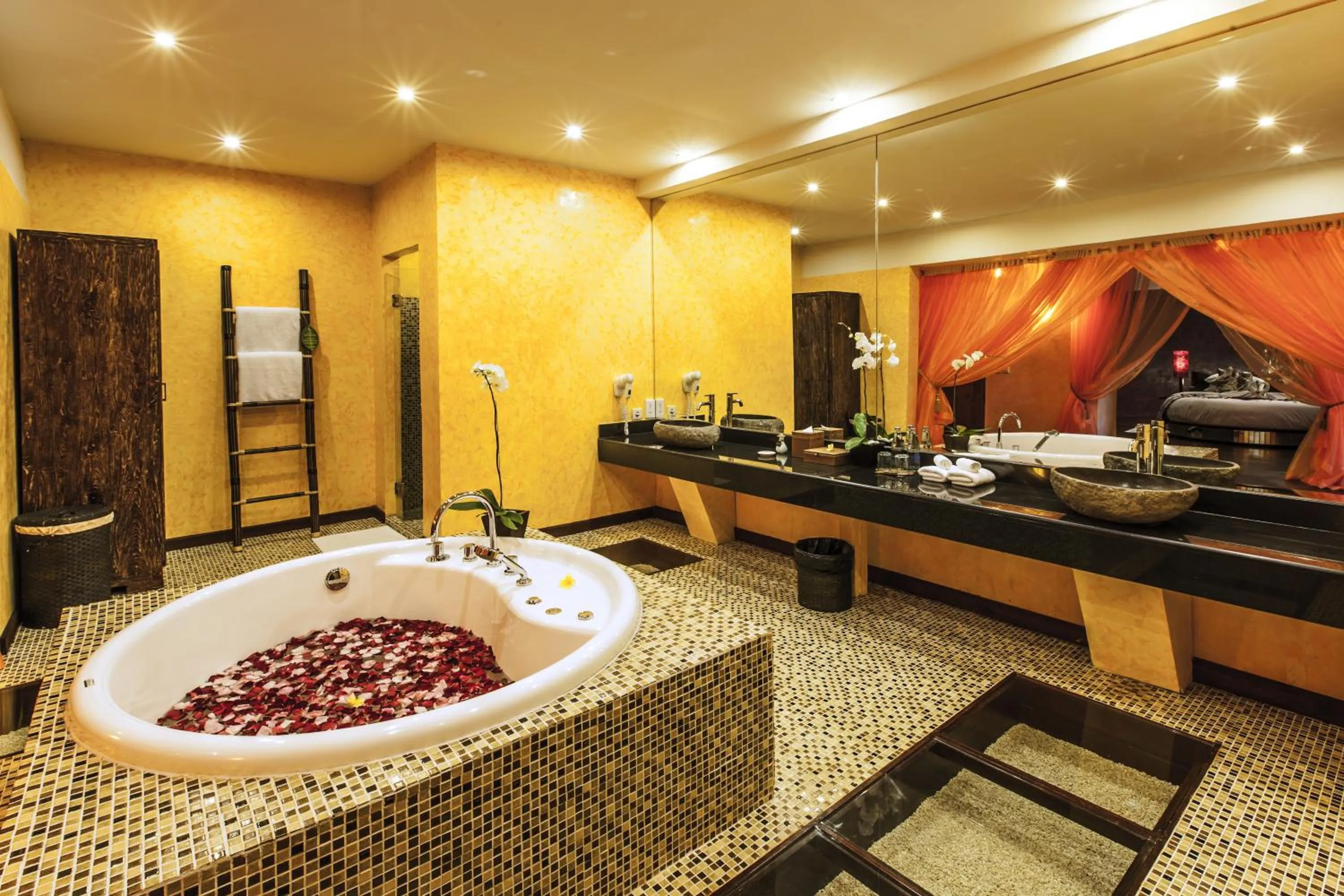 Bathroom in Kupu Kupu Jimbaran Beach Hotel & Spa by L’Occitane