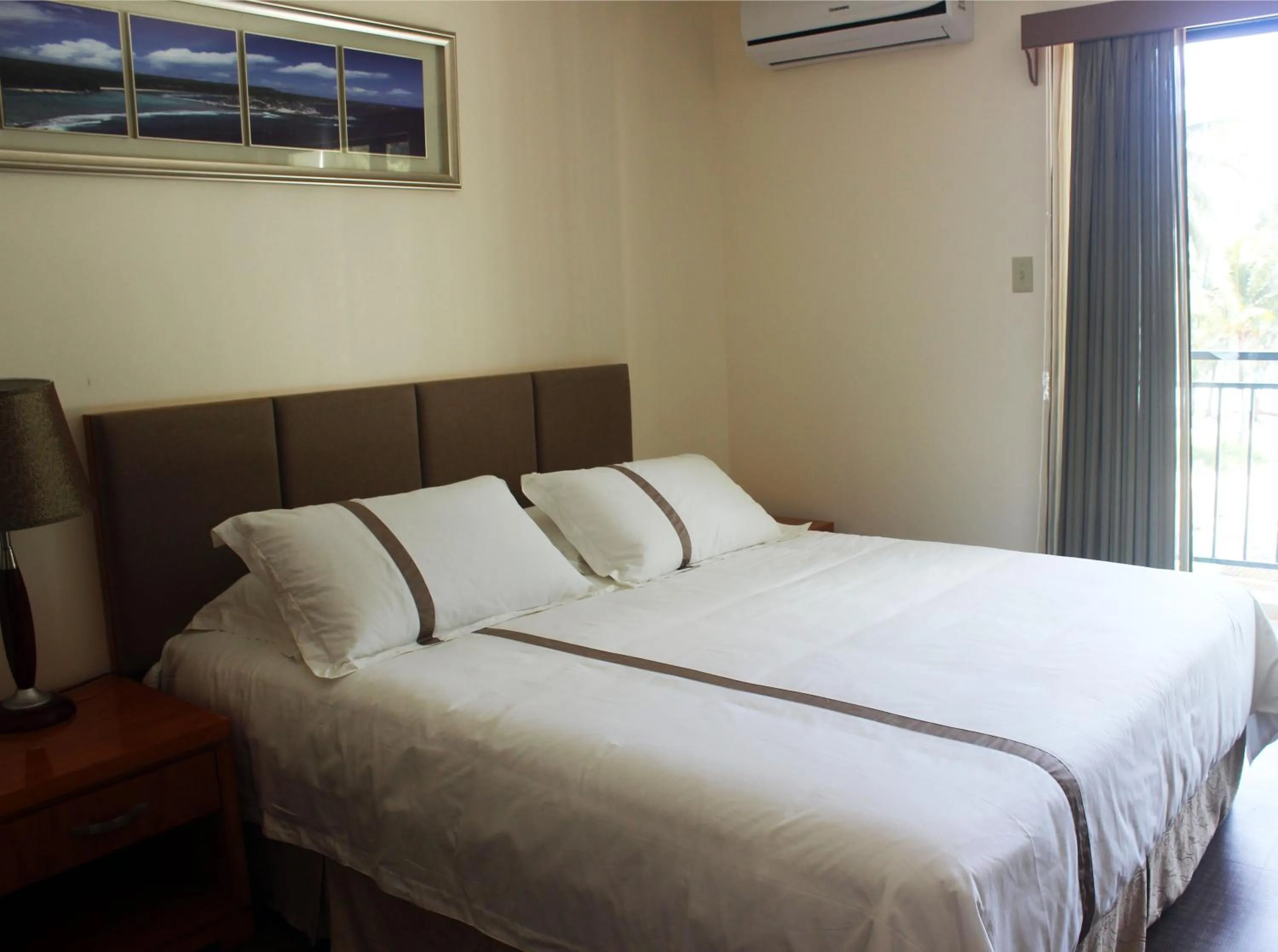 Bedroom, Bed in Saipan Beach Hotel