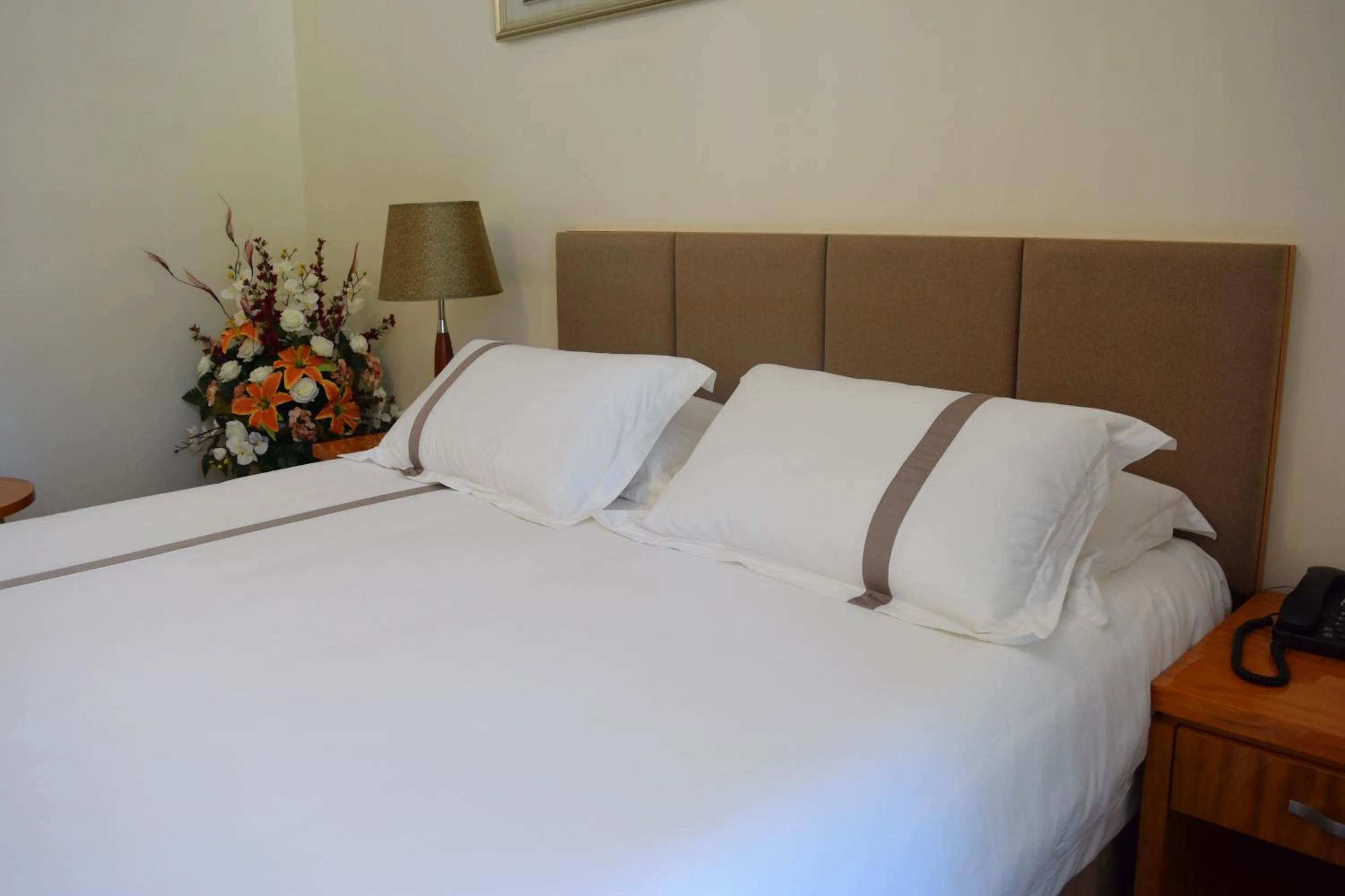 Bed in Saipan Beach Hotel