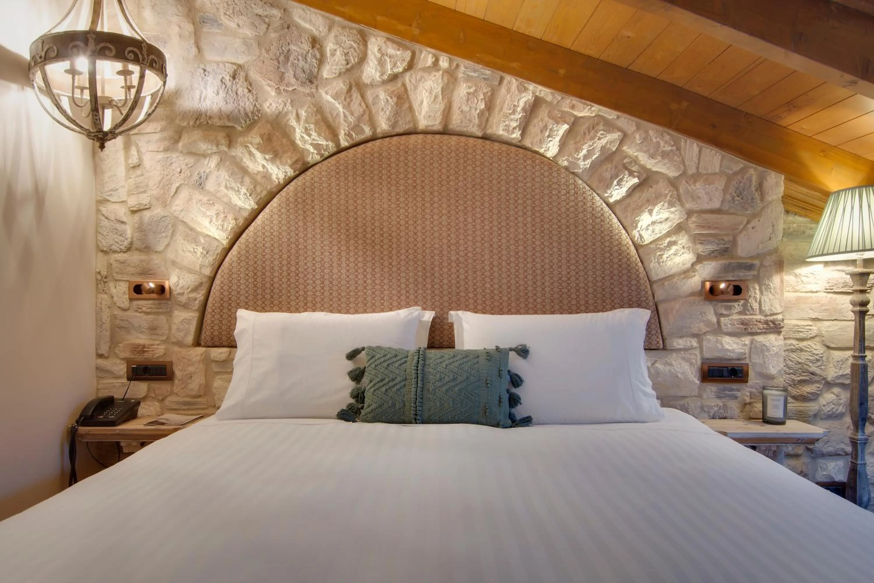 Bed in ARCHONTARIKI Historic Boutique Hotel