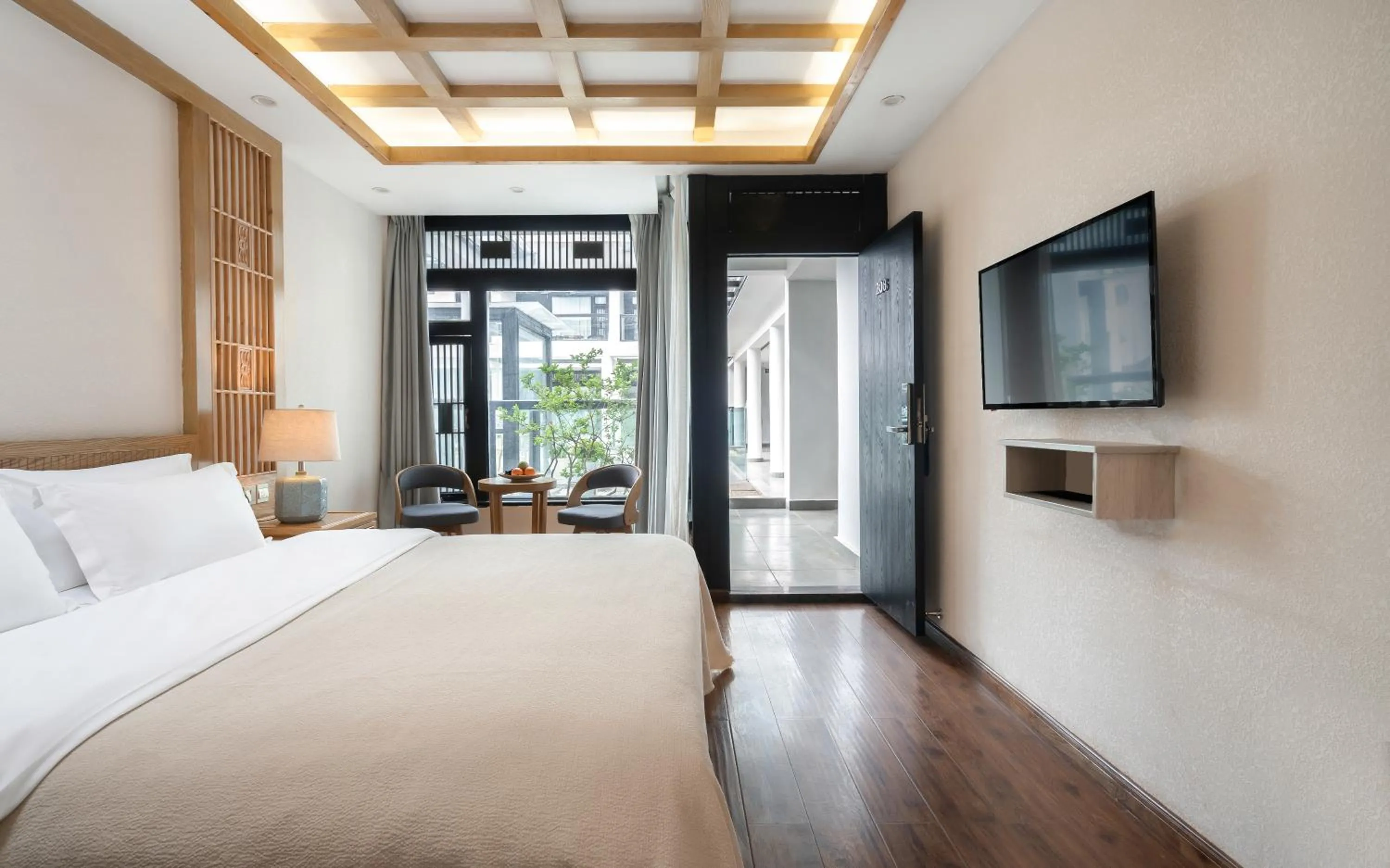 Photo of the whole room, Bed in Lijiang Gemmer Hotel