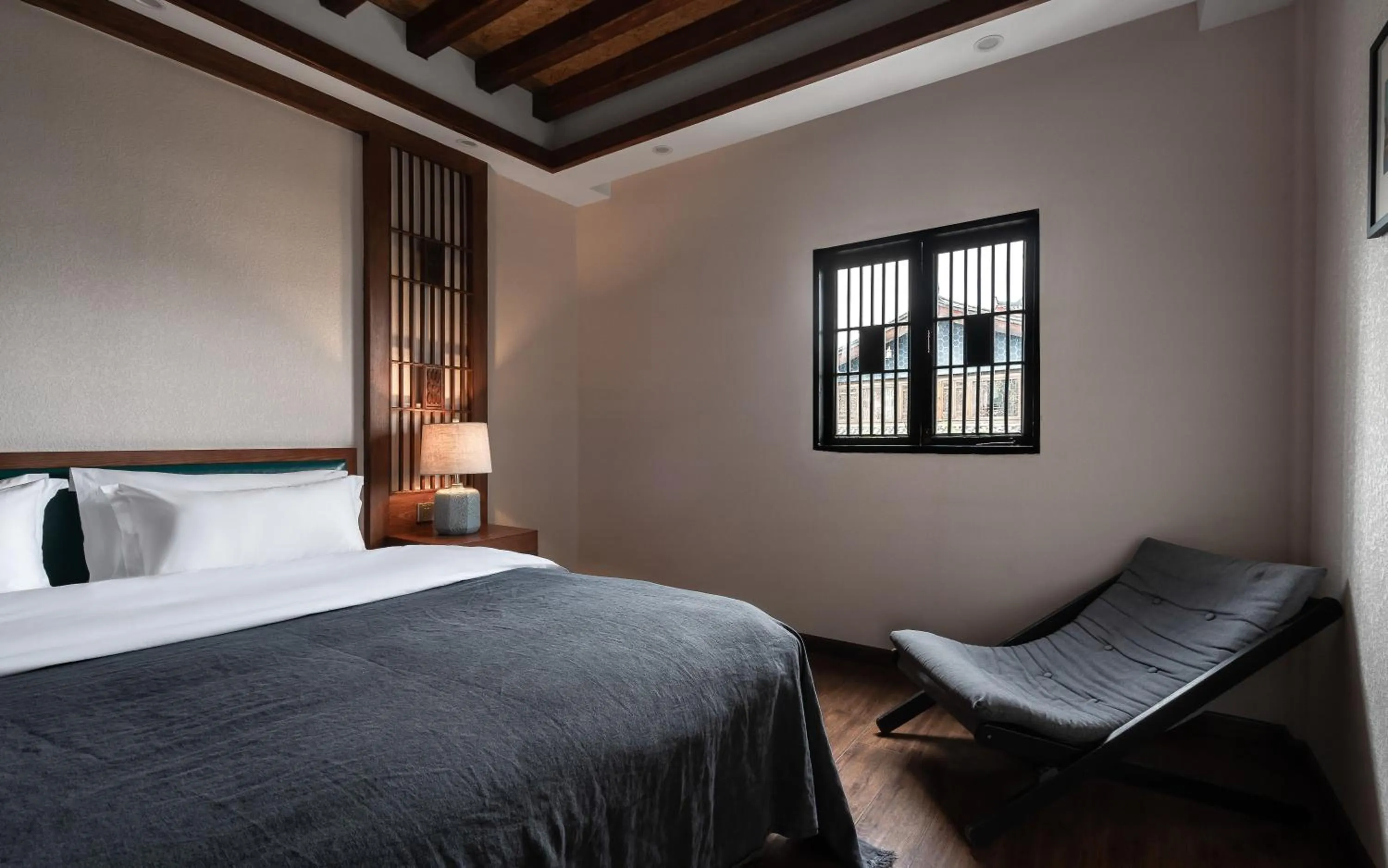 Bed in Lijiang Gemmer Hotel