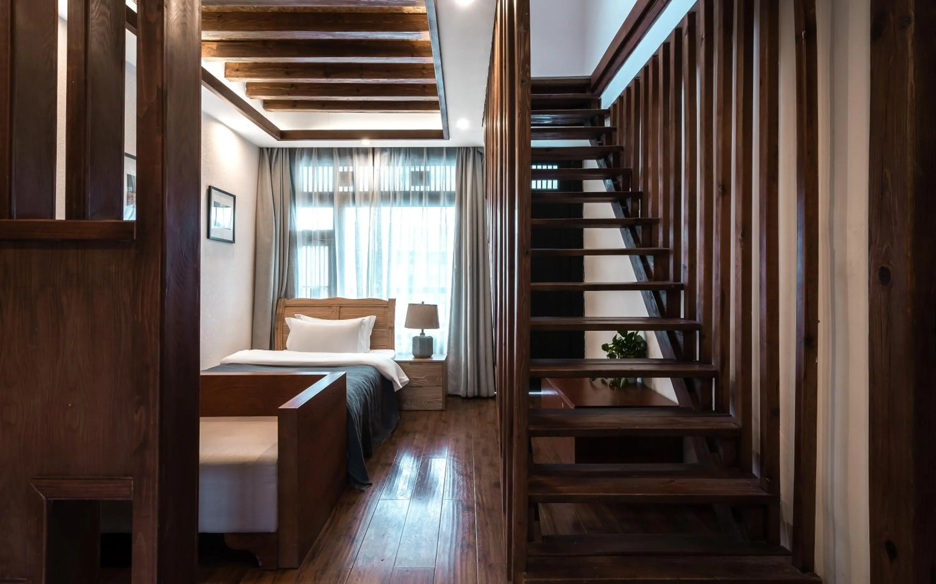 Bedroom in Lijiang Gemmer Hotel