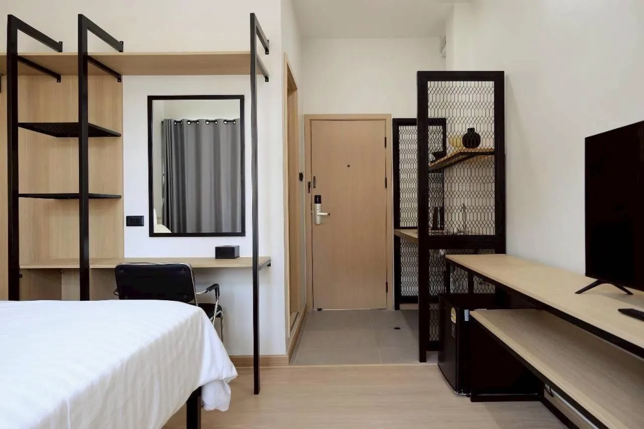 Photo of the whole room, Bed in Baan Noppadol