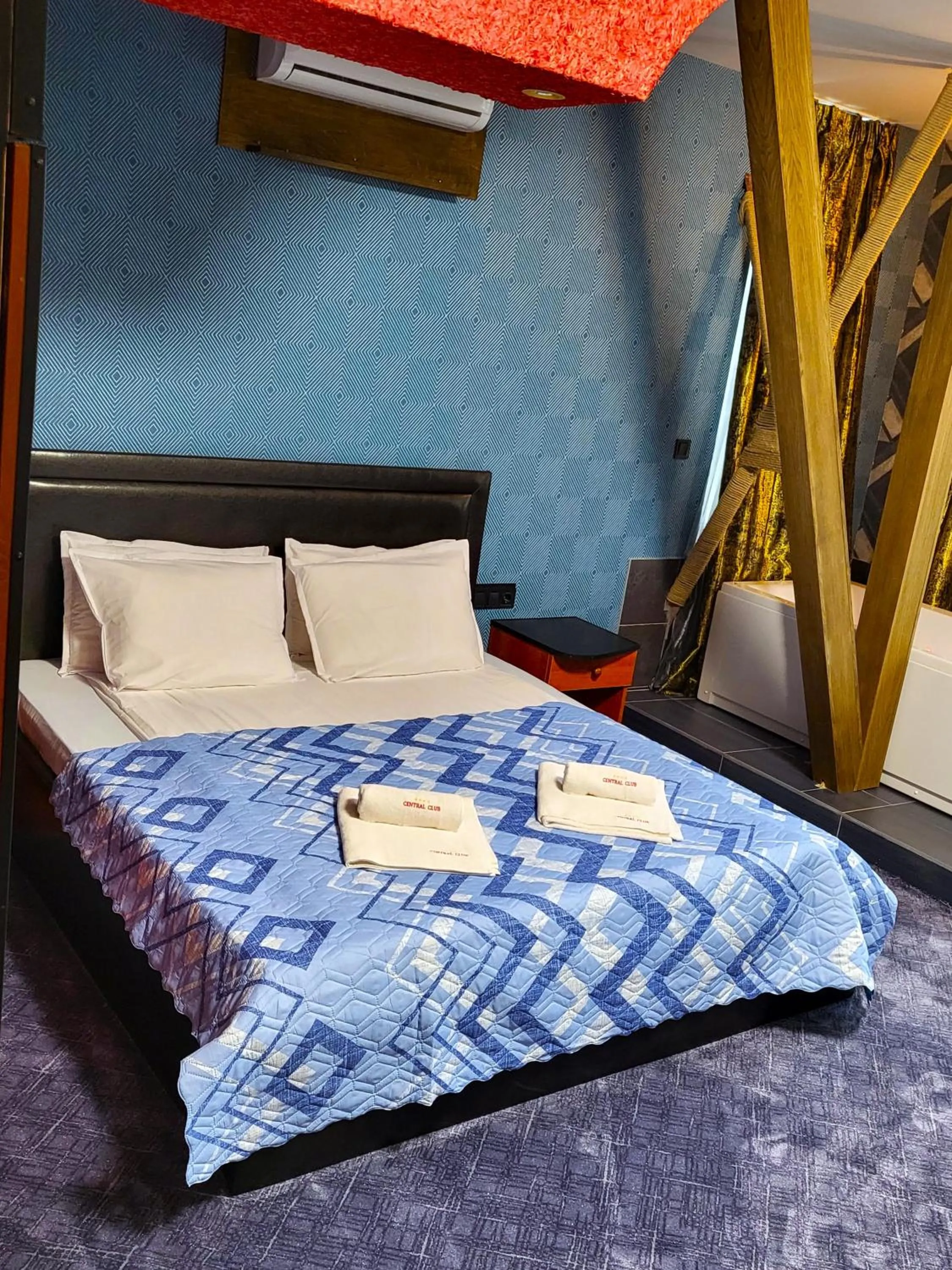 Bed in Gloria Palace Hotel