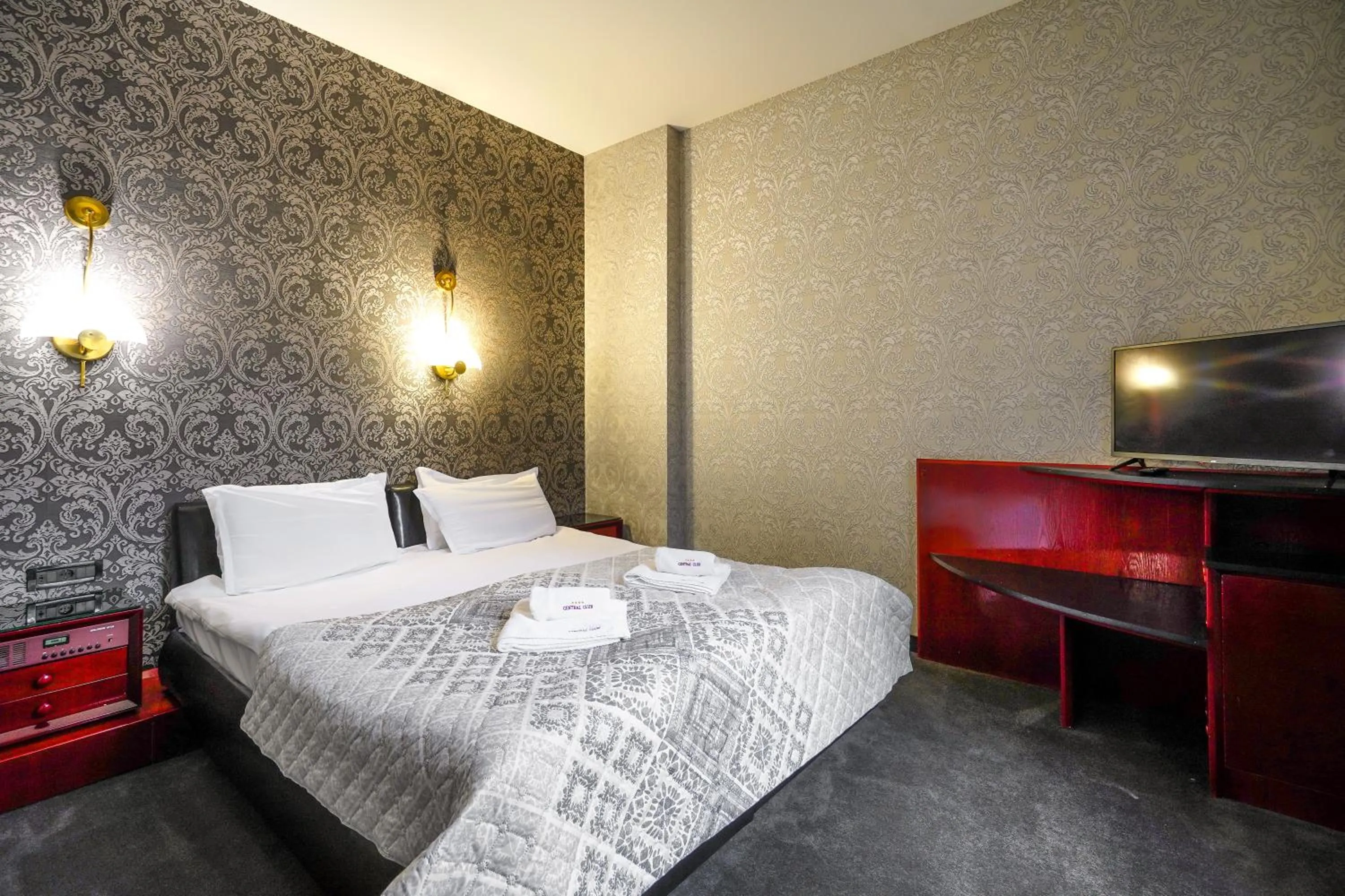 Bed in Gloria Palace Hotel