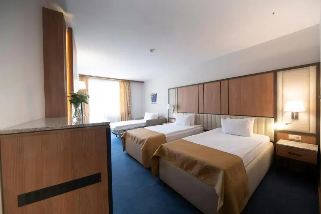 Bed in Legends Hotel Bed in Legends Hotel