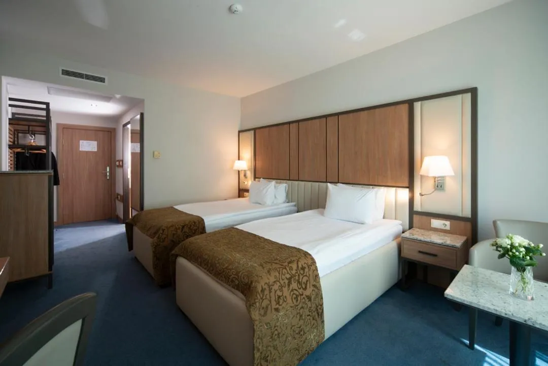 Bed in Legends Hotel