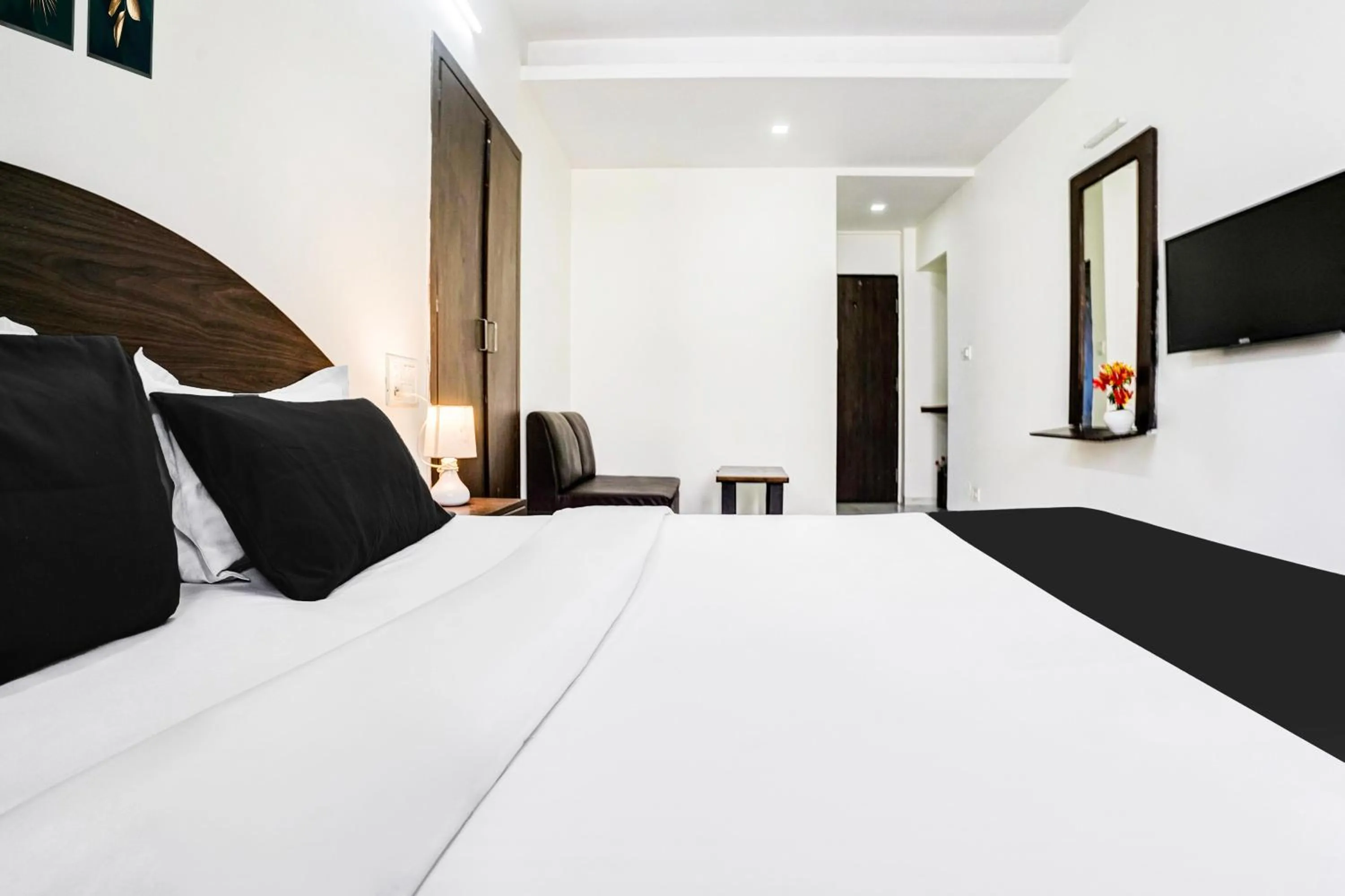 Bedroom, Bed in FabHotel Sahara Inn - Nr Vijay Mamta Theatre, Nashik Road