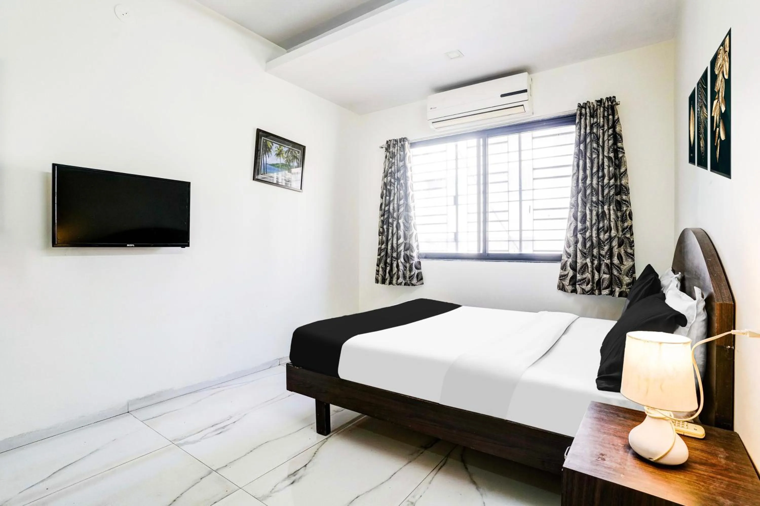 Bedroom, Bed in FabHotel Sahara Inn - Nr Vijay Mamta Theatre, Nashik Road