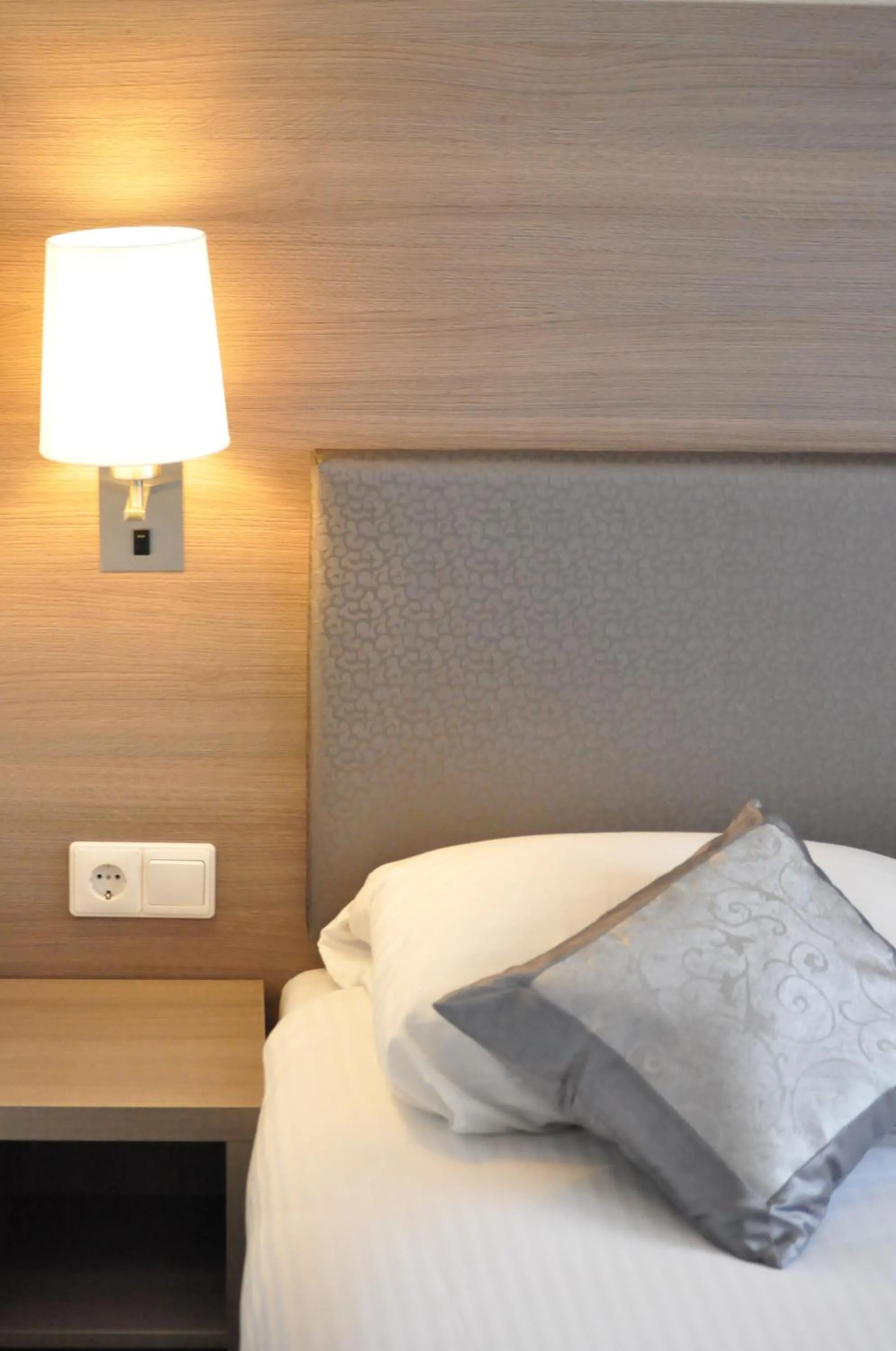 Bed in The Concert Hotel