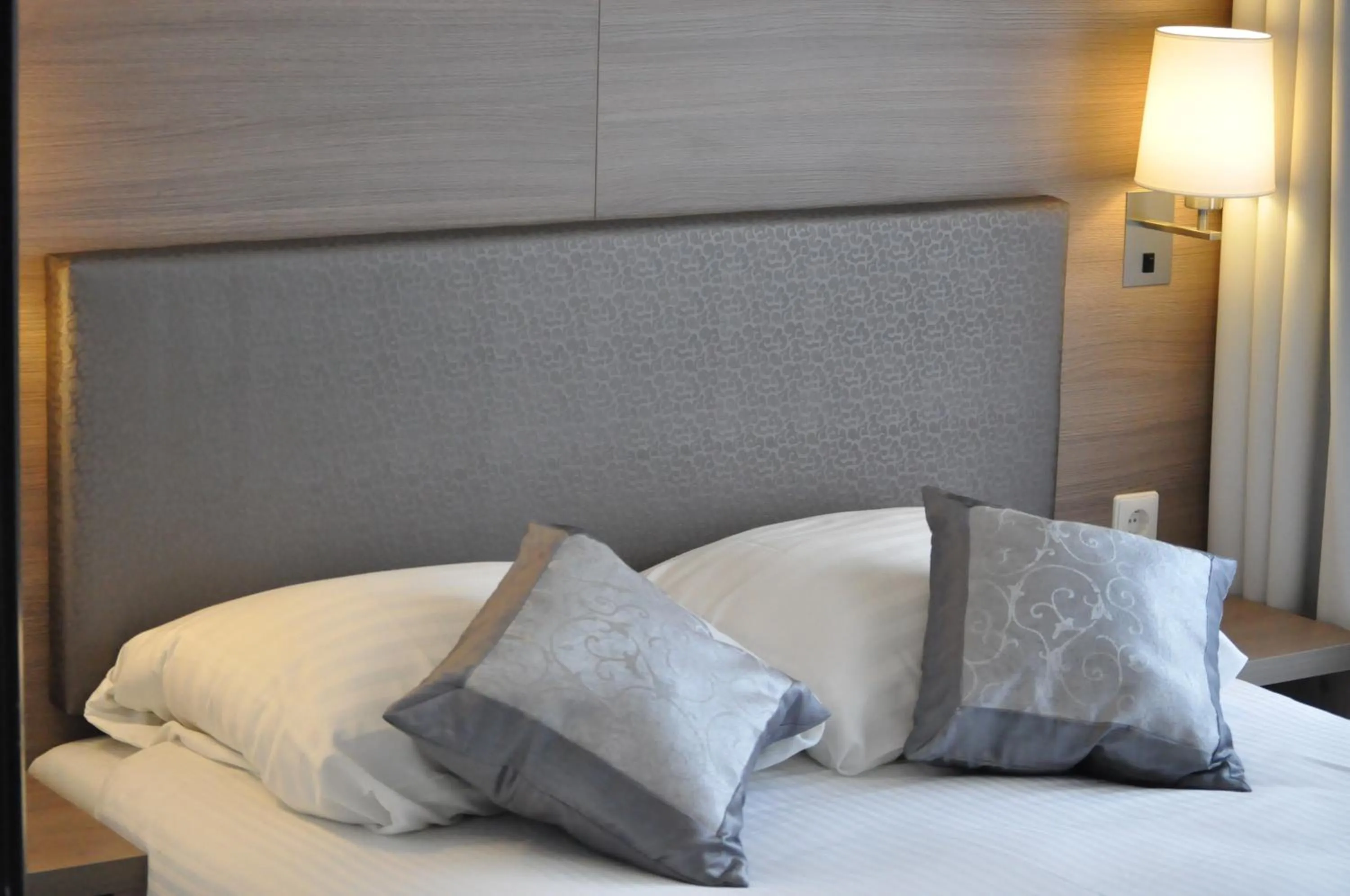 Bed in The Concert Hotel